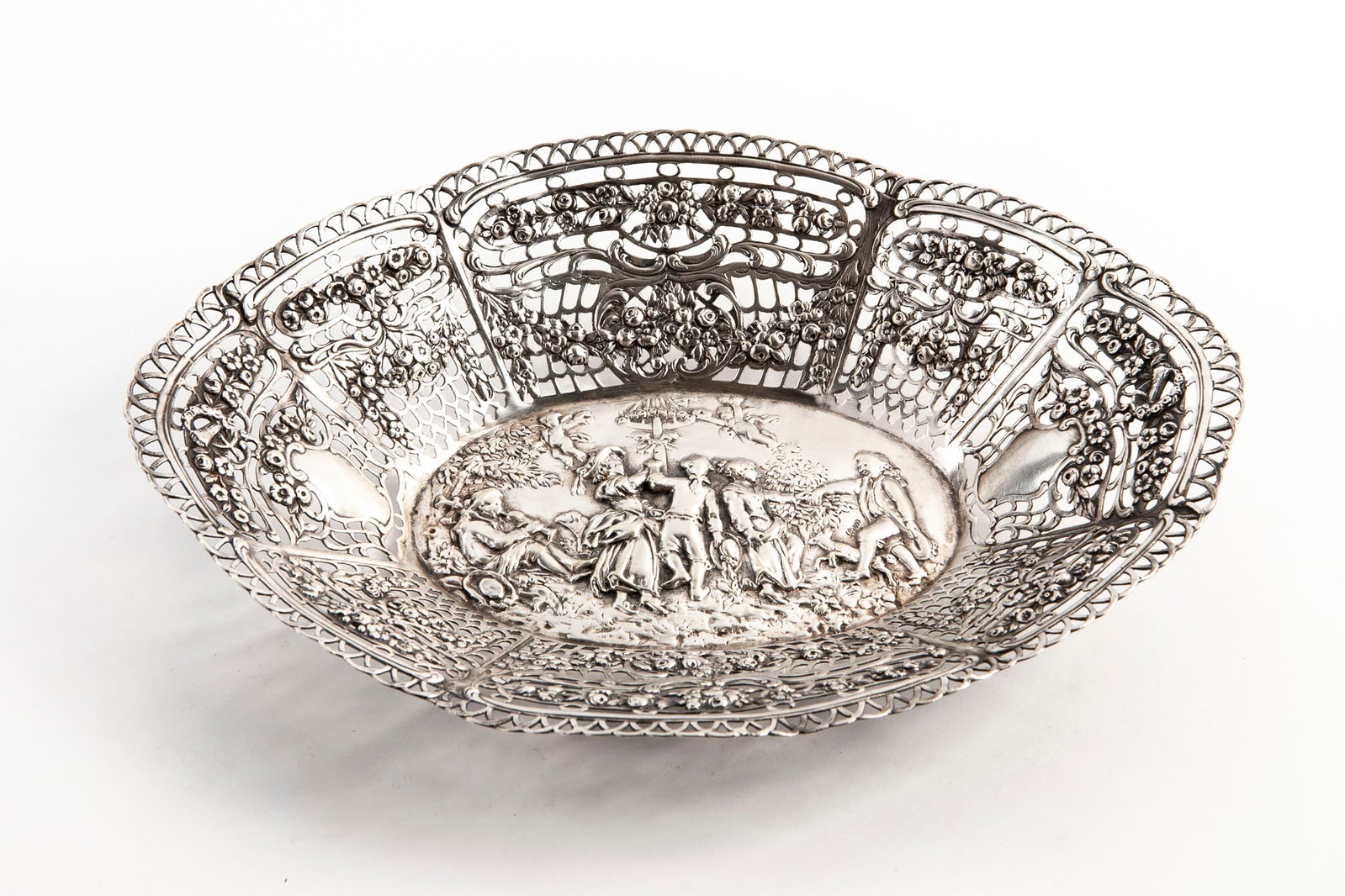 An antique German silver bowl, made of 800 silver, hallmarked, with relief decorations depicting a: An antique German silver bowl, made of 800 silver, hallmarked, with relief decorations depicting a scene of peasants dancing around a column and angels, weight: 255 grams, height: 5 cm, width: 27 cm, 