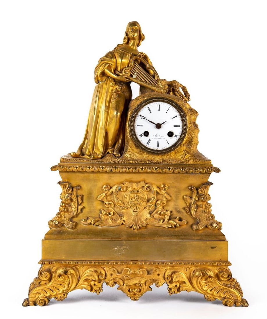 Antique 19th century mantel clock, made of Ormolu, the numerals dial are signed Mertens A.: Antique 19th century mantel clock, made of Ormolu, the numerals dial are signed Mertens A. Bruxelles, working condition not tested, Height: 43 cm, Base width: 33 cm,