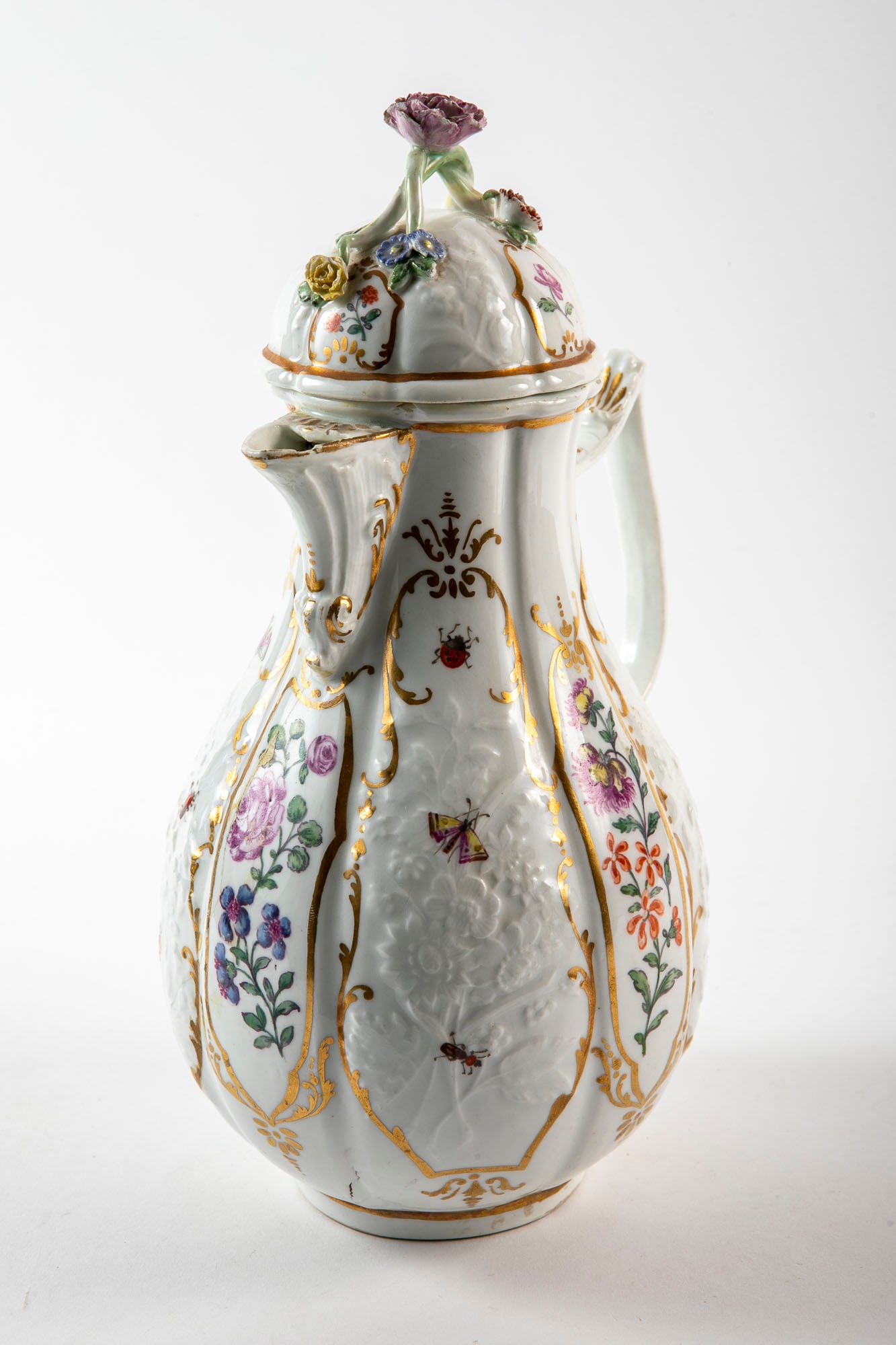 An antique German porcelain jug from the 18th century (circa 1740-1750), made in Meissen, made of: An antique German porcelain jug from the 18th century (circa 1740-1750), made in Meissen, made of porcelain decorated with hand paintings of flowers in enamel and gold, signed, old repair, Total heigh