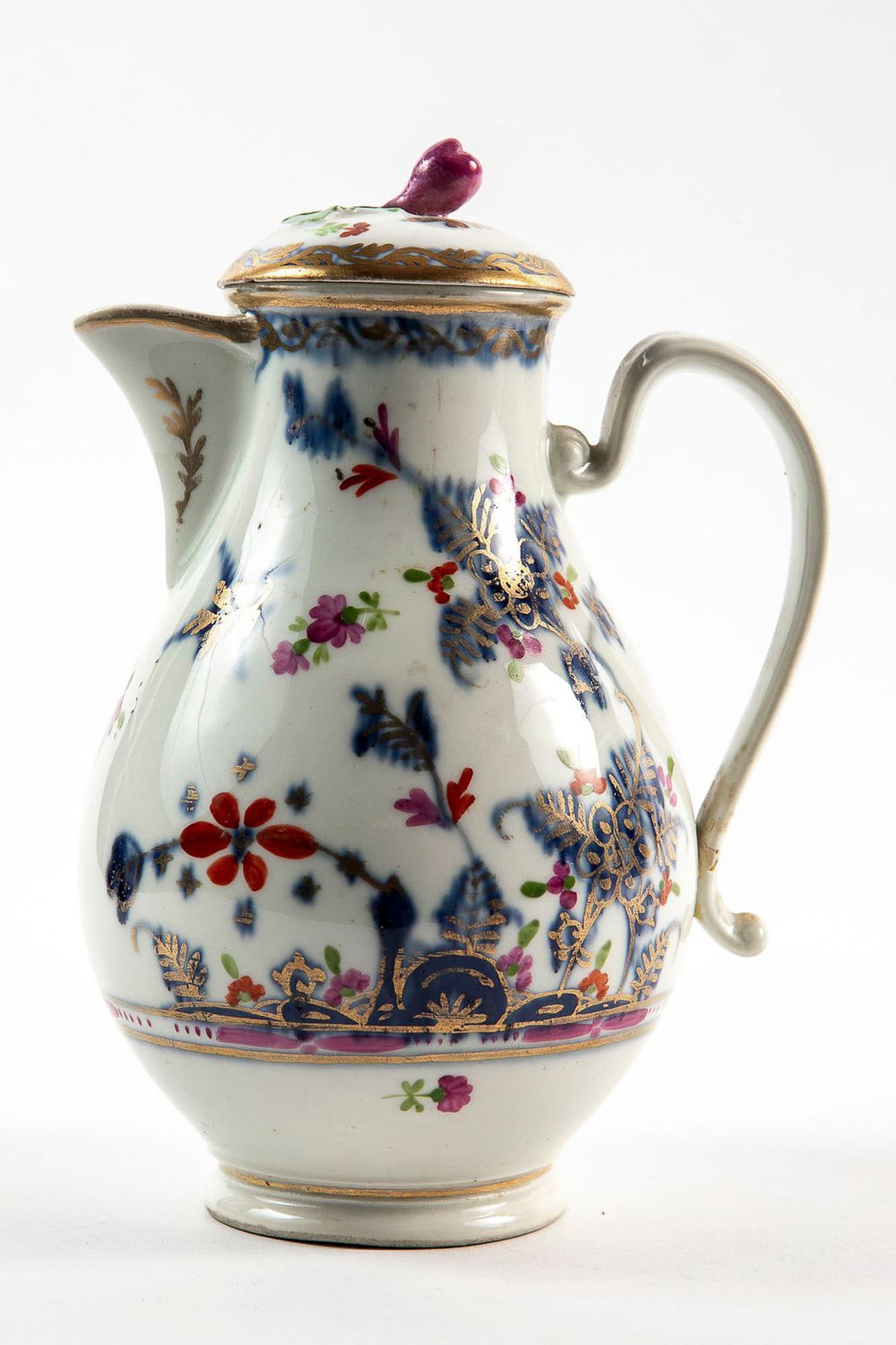 An antique Viennese jug from the 18th century (circa 1745-1730), made by Old Vienna (Alt Wien),: An antique Viennese jug from the 18th century (circa 1745-1730), made by Old Vienna (Alt Wien), decorated with paintings in enamel and gold, signed, chips to the rim of the lid and a small crack in th