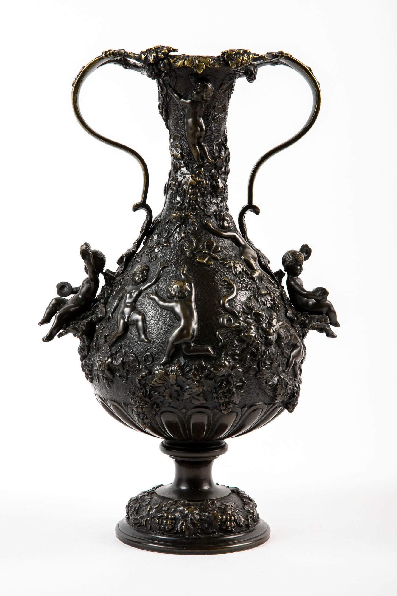 An antique French bronze vase from the end of the 19th century, decorated with children's figures,: An antique French bronze vase from the end of the 19th century, decorated with children's figures, Height: 31 cm, width: 20 cm,