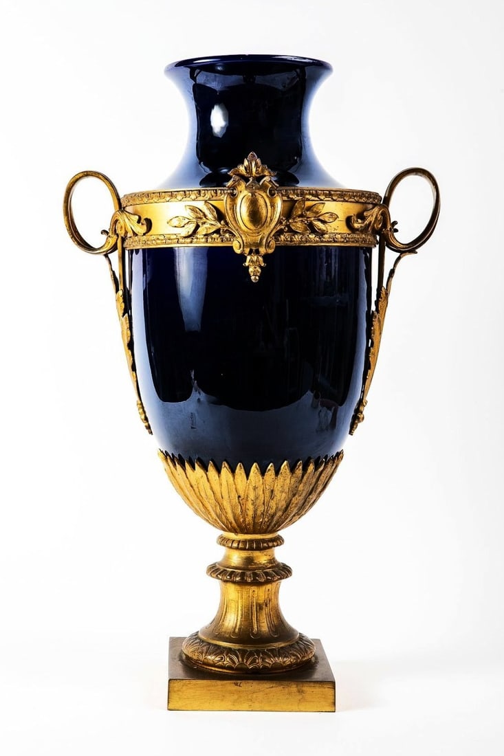 An antique, high quality and impressive French vase from the 19th century (circa 1870-1890), made of: An antique, high quality and impressive French vase from the 19th century (circa 1870-1890), made of cobalt blue coated porcelain and gold plated bronze mounts, Height: 50 cm, width including handles: