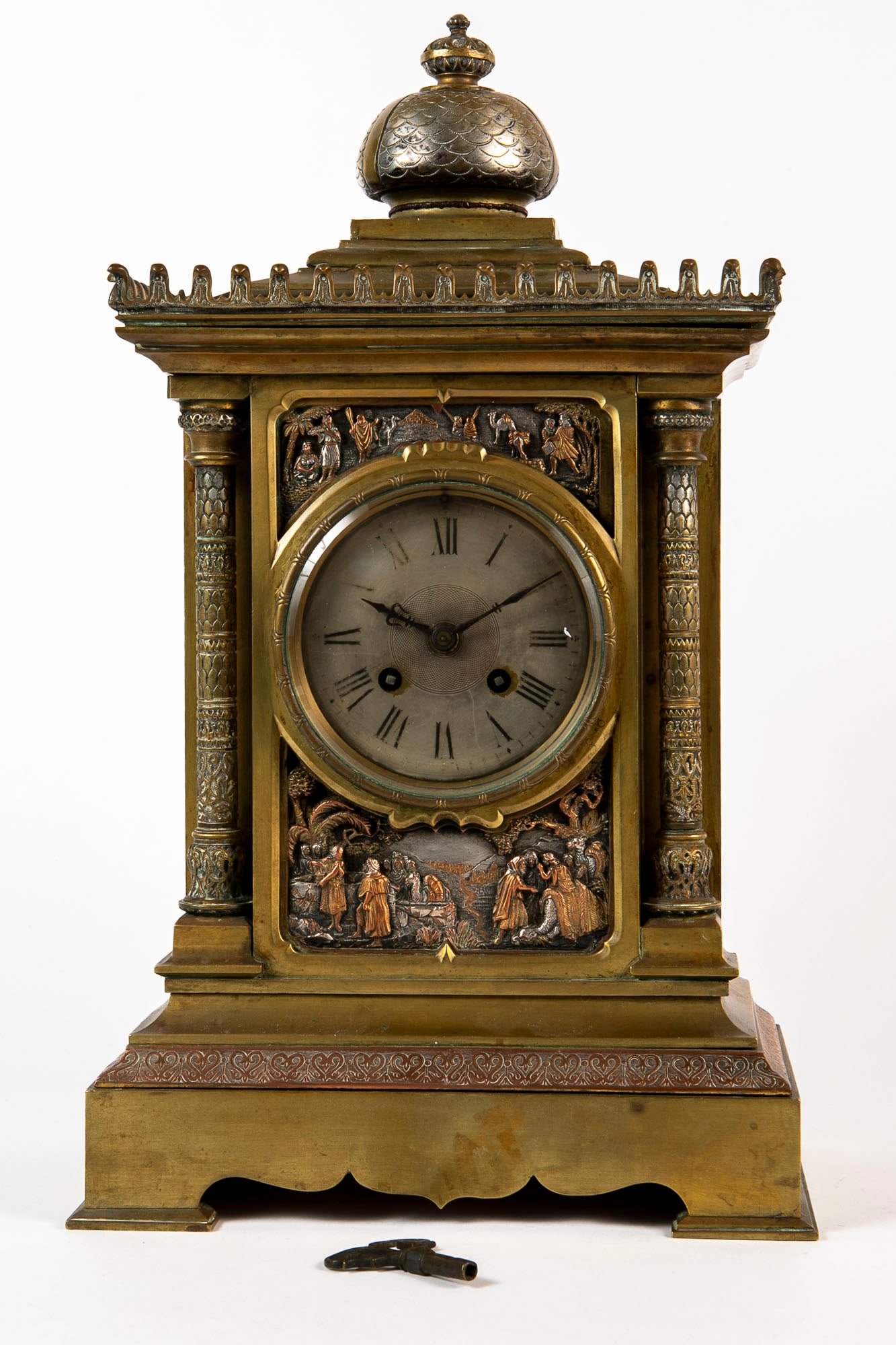 An antique French clock from the 19th century, made of bronze and decorated with oriental scenes,: An antique French clock from the 19th century, made of bronze and decorated with oriental scenes, remnants of silver plating, mechanism made by Horlogerie AB DE PARIS Company name: Familia Brocot, Par