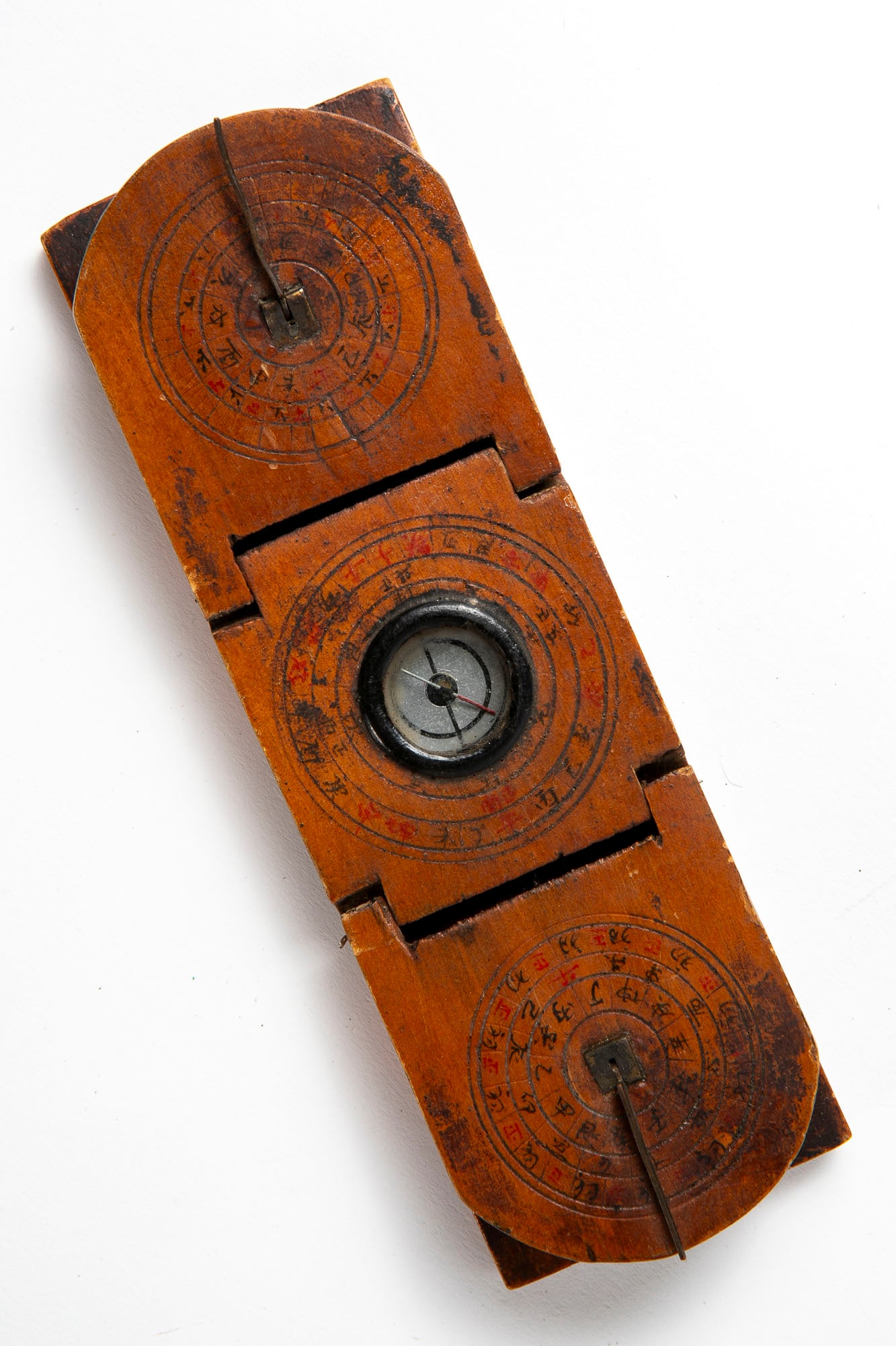 An antique Chinese compass, circa 1900, made of wood, Length: 16 cm, width: 5 cm, (1 of 5)