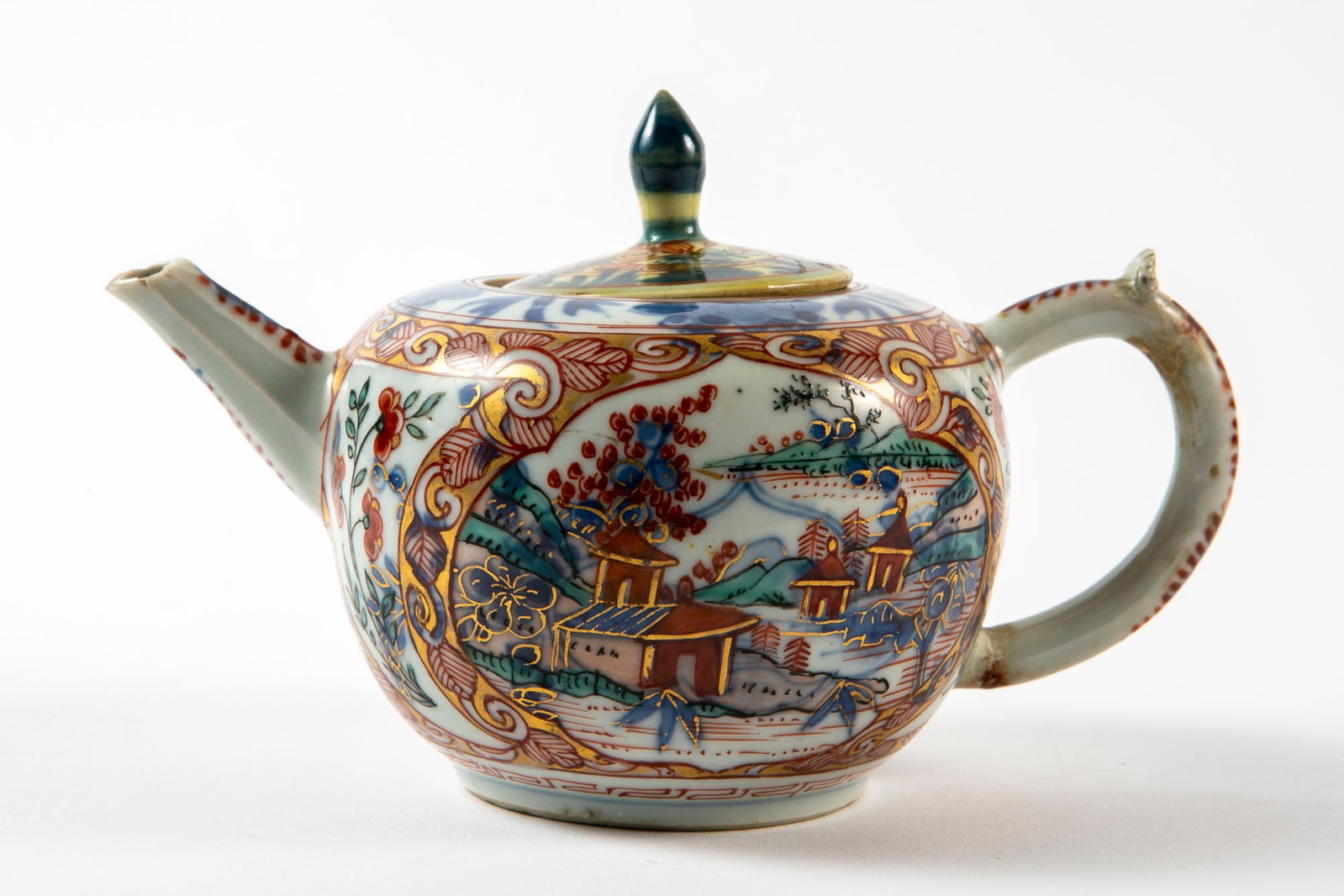 An antique Chinese teapot from the 19th century, decorated with hand paintings, an old repair to the (1 of 6)