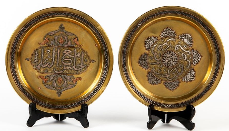 A pair of Islamic plates, decorated with Damascus work, Diameter: 24.5 cm, (1 of 3)