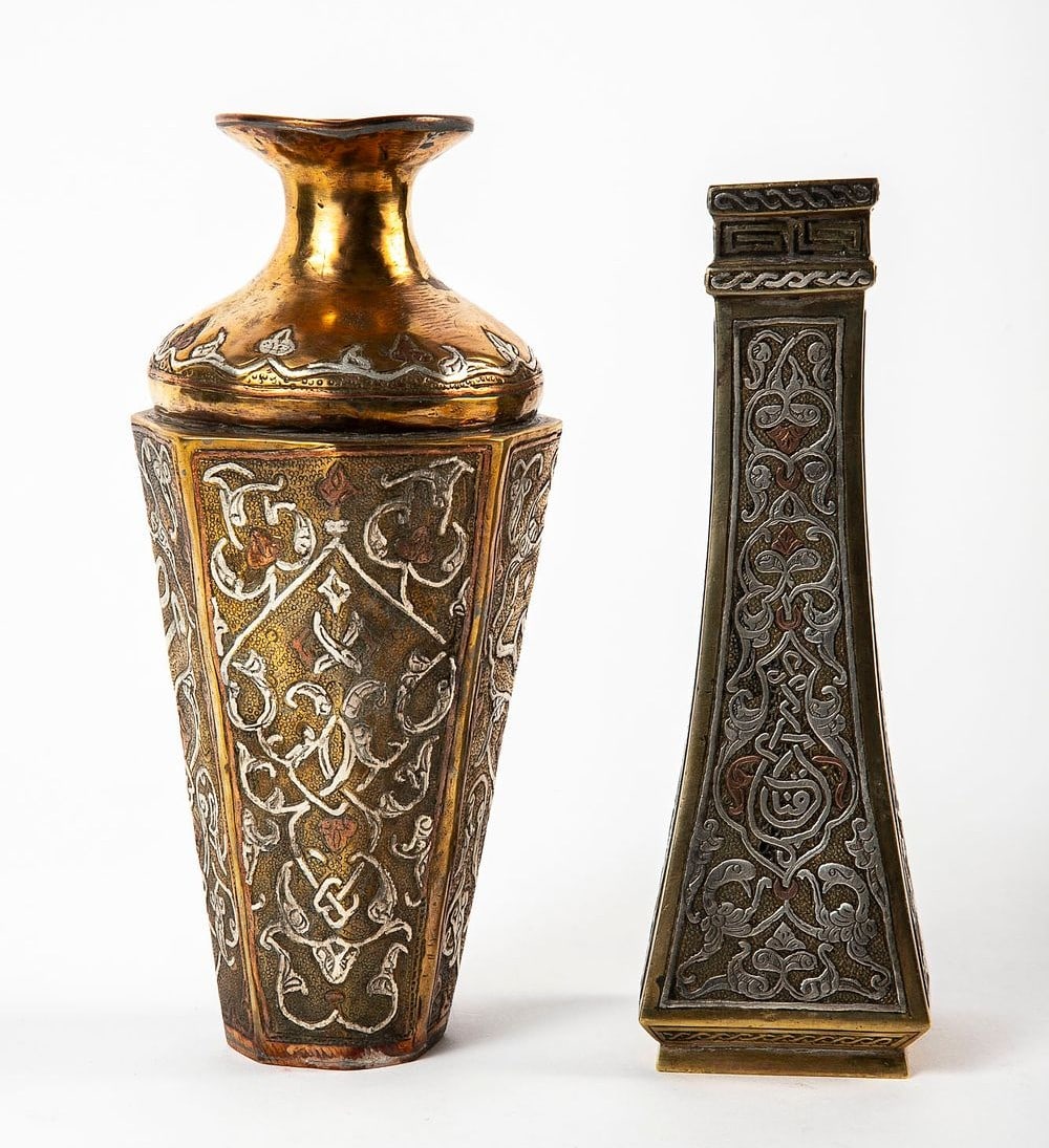 A pair of Islamic vases, decorated with Damascus work, Height respectively: 17.5 and 19.5 cm, (1 of 5)
