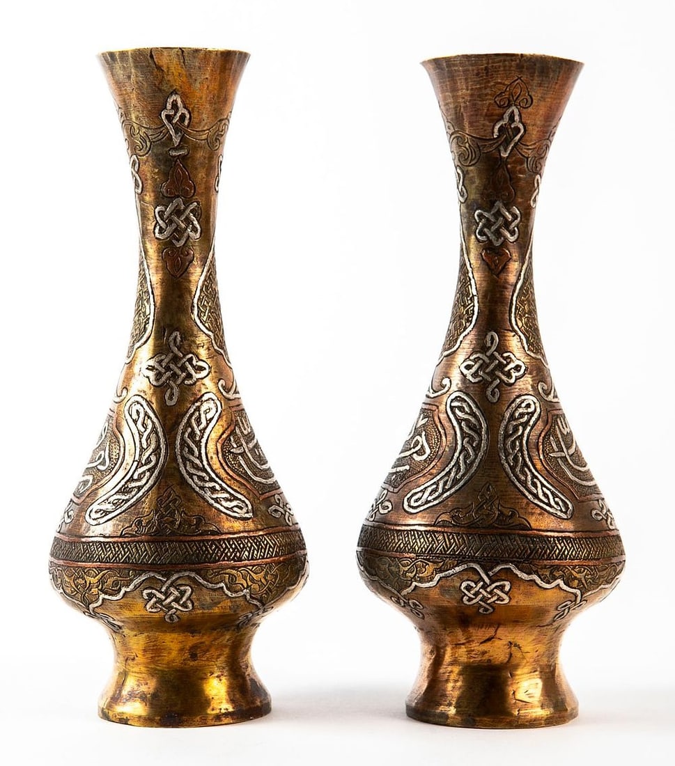 A pair of Islamic vases, decorated with Damascus work, Height: 18 cm, width: 8 cm, (1 of 4)