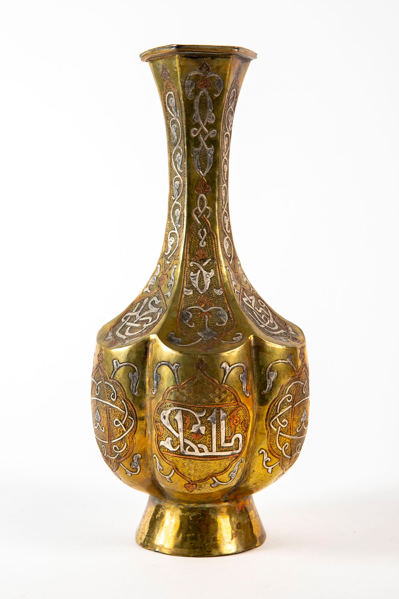 An antique Islamic vase, decorated with Damascus work, Height: 26.5 cm, width: 13 cm, (1 of 3)