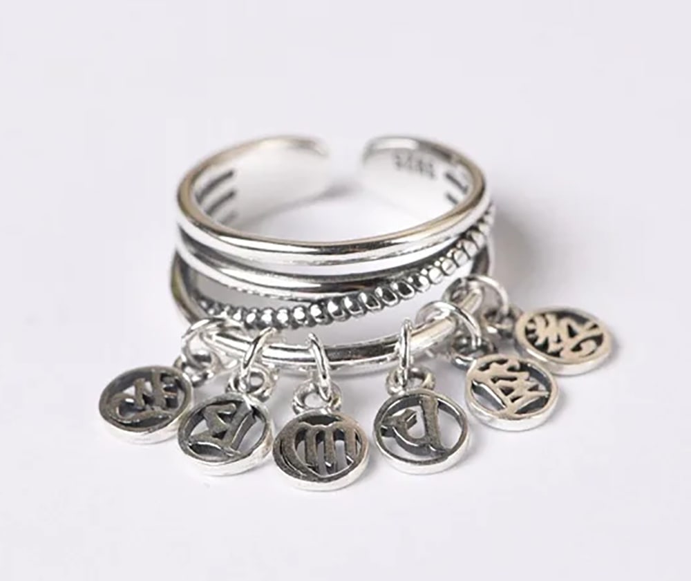 925 Silver Tibetan Mantra Ring Buddhist Jewelry: Size: Resizable. Width 9 mm. Weight 6.1 g. Materials: 925 sterling silver. Condition: Immaculate condition. Crafted from silver, this Buddhist OM Mani Padme Hum ring is more than just jewelry - it's a