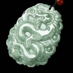 Asian Burmese Jade Carved Dragon Design Pendant: Materials: A-grade Burmese jade. Condition: Flawless preservation condition. A mesmerizing piece of artistry and a symbol of strength and good fortune. Meticulously crafted from the finest A-grade Bur