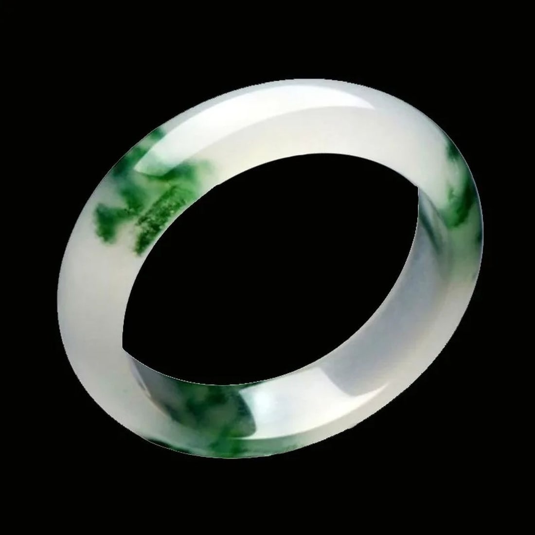 Elegant Chinese Jade Bangle Hand-Carved Jewelry: Size: Inner Diameter 54-56 mm. Weight 50 g. Materials: Jade. Condition: Immaculate condition. Bangle bracelet made of jade. This bangle is mostly white with patches of green. This type of jade is some