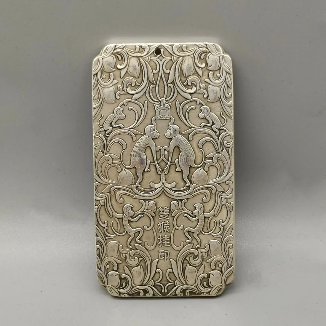 Retro Chinese Monkeys Plate Charm Amulet Mascot: Size: Height 10 cm - Width 5 cm. Weight 130 g. Materials: Tibetan silver (alloy of tin with copper or zinc). Condition: Resembles a retro aesthetic. This vintage-style crafted of Tibetan silver amulet