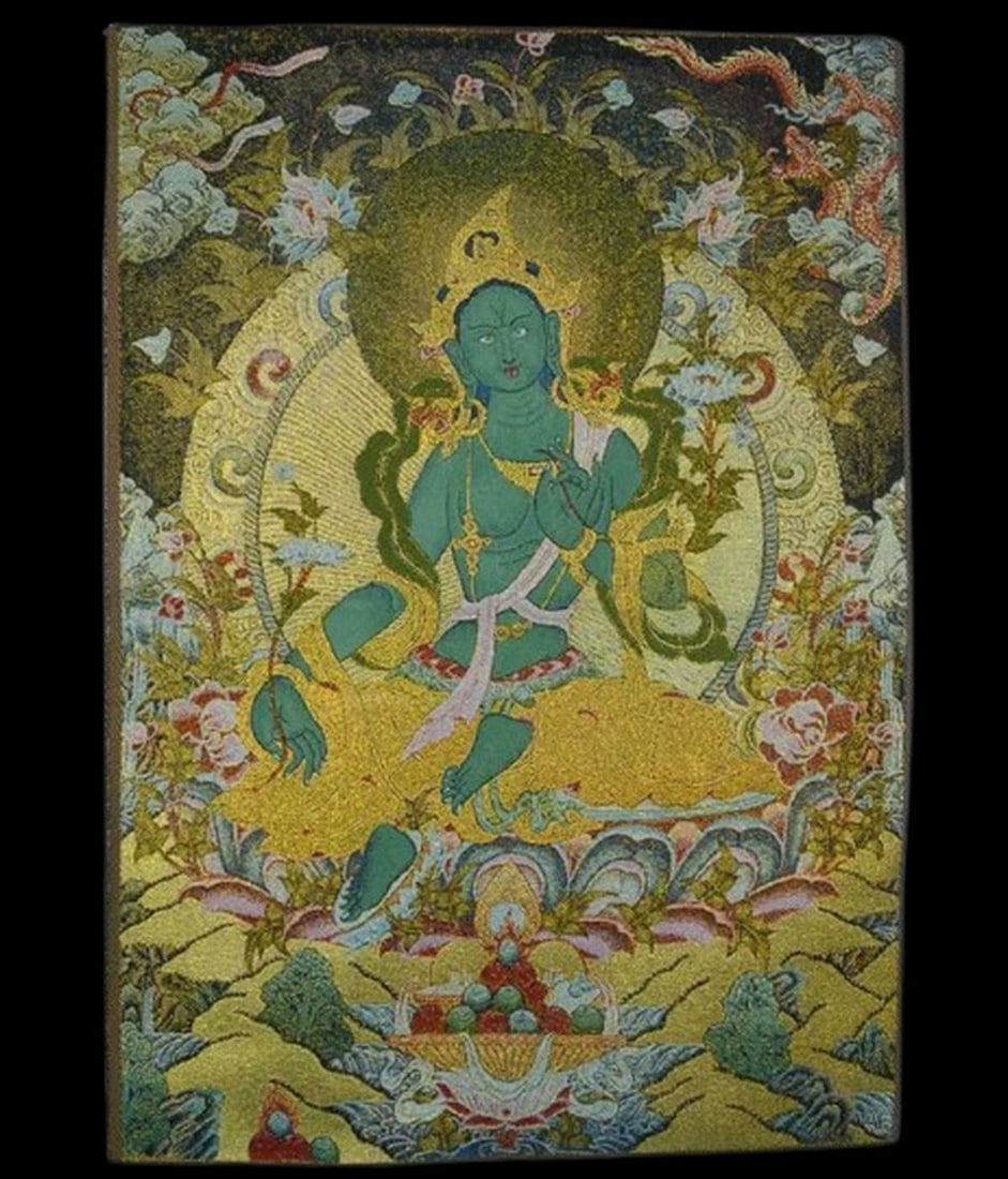 Hand-Embroider Tibetan Thangka Tara Silk Tapestry: Size: Length 60 cm - Width 40 cm. Materials: Silk. Condition: Appears to have a classic aesthetic. This retro-style crafted Tibetan Thangka depicts Green Tara, the revered goddess of compassion and pr