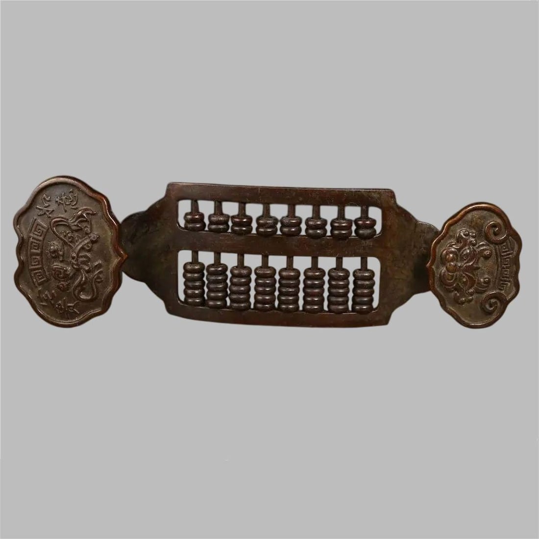Bronze Ruyi Abacus Dragon Motif Floral Patterns: Size: Height 5.2 cm - Length 18.7 cm. Materials: Bronze, Copper. Condition: Looks like vintage. This is a retro-style bronze Ruyi abacus, a finely crafted antique combining utility and artistic design