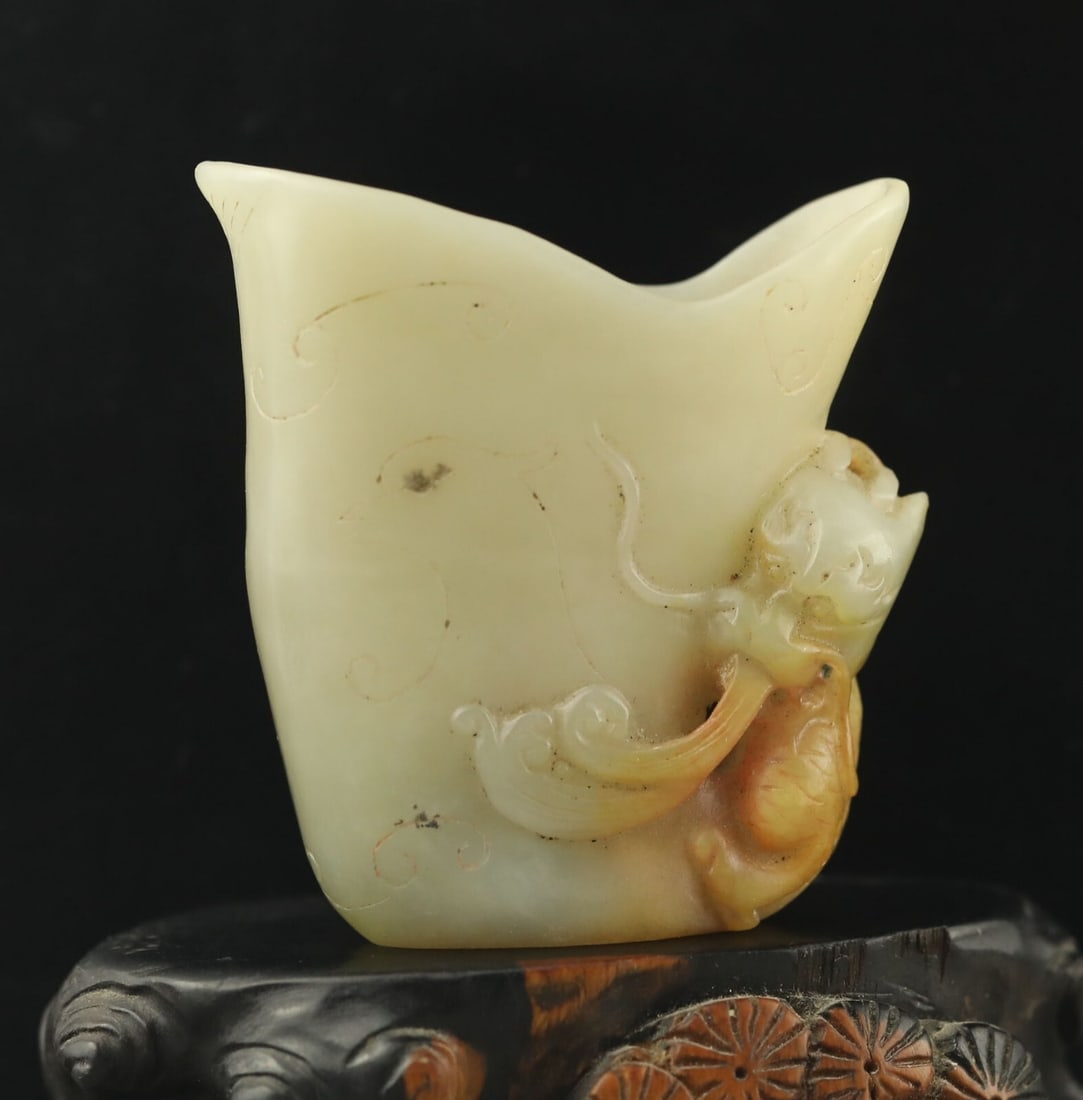 Hand-Carved Wine Cup Hetian Jade Loong Dragon: Size: Height 2 cm - Length 6 cm - Width 6 cm. Materials: Hetian jade. Condition: Appears to have a classic aesthetic. This retro style Chinese cup is a hand-carved wine cup statue crafted from Hetian