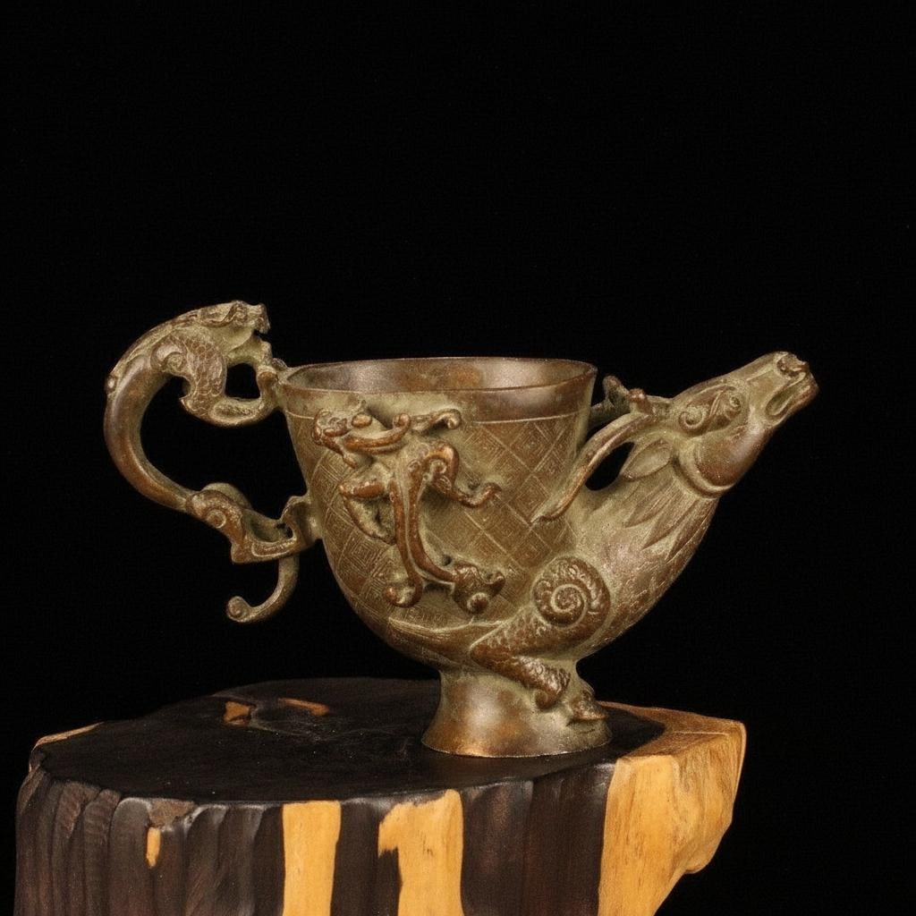 Retro-style Asian Wine Goblet Copper Deer Dragons: Size: Height 9 cm - Length 14 cm - Width 7 cm. Weight 1 kg. Materials: Copper. Condition: Excellent. This retro-style Chinese decorative wine goblet is cast from copper with a bronze finish. The vesse