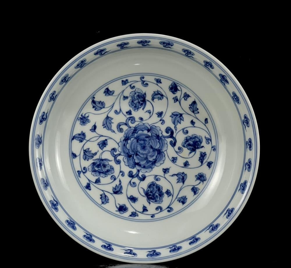 Chinese Porcelain Blue White Floral Motif Plate: Size: Height 5 cm - Length 21 cm - Width 21 cm. Materials: Porcelain. Condition: Appears to have a classic aesthetic. This retro-style Chinese porcelain dish features blue and white decoration with a