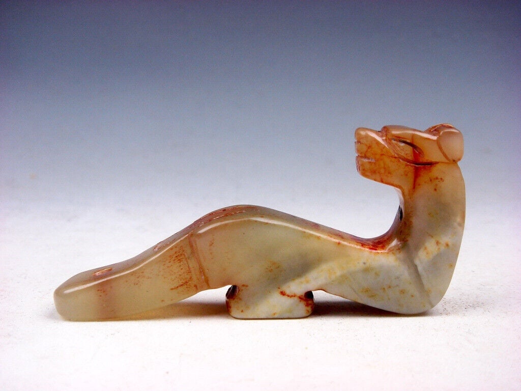 Jade Sculpture Ruyi Scepter Dragon Blessing Figure: Size: Height 3 cm - Length 7.5 cm - Width 1.2 cm. Materials: Jade. Condition: Excellent. This antique inspired sculpture is a Ru-Yi scepter carved from jade stone. The piece features a detailed dragon