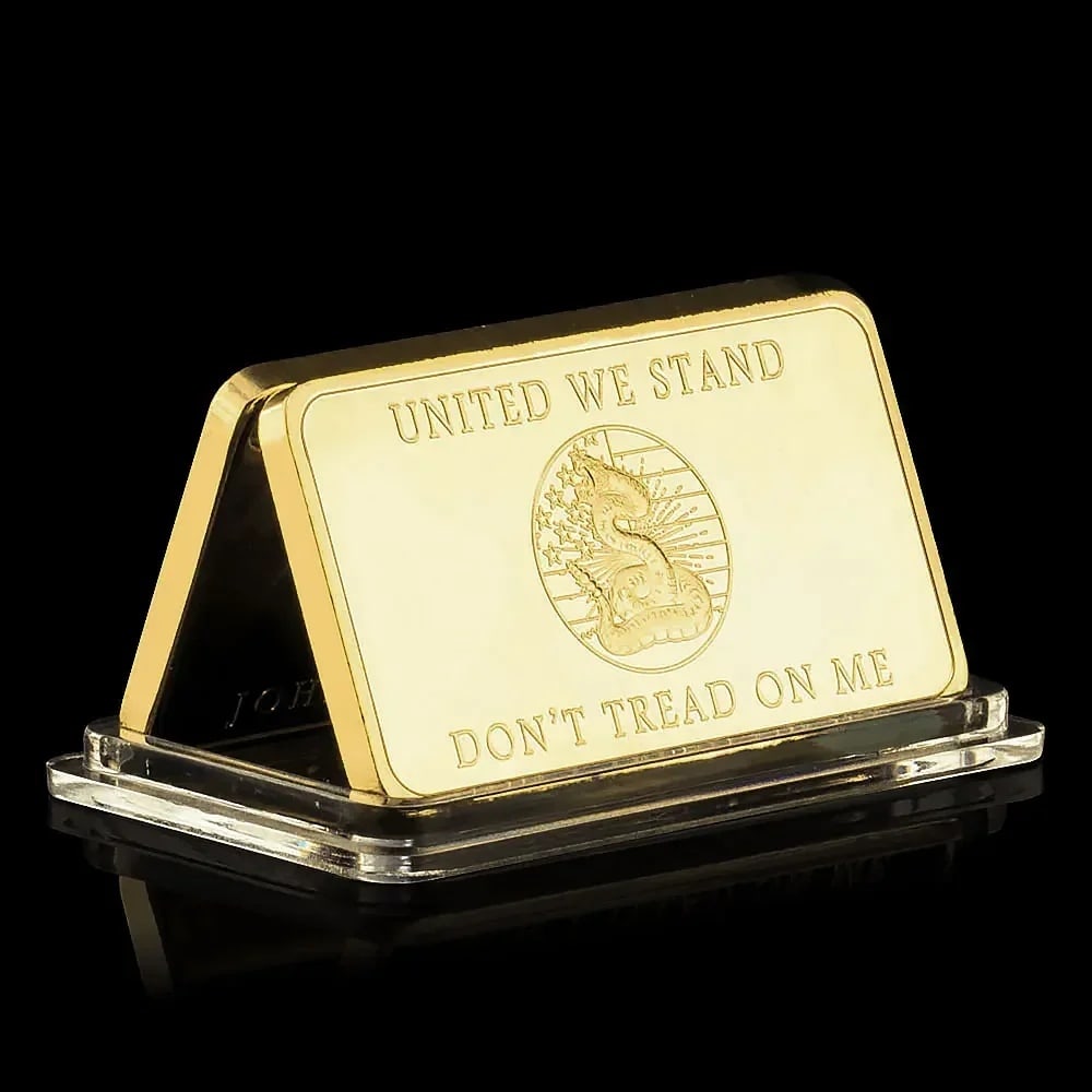 Gilt Iron Bar Liberty Bell Don't Tread Rectangular: Size: Height 0.3 cm - Length 5 cm - Width 2.8 cm. Materials: Iron, gold plated. Condition: New. This commemorative piece is a rectangular, double-sided replica bar crafted from a gold-plated iron core