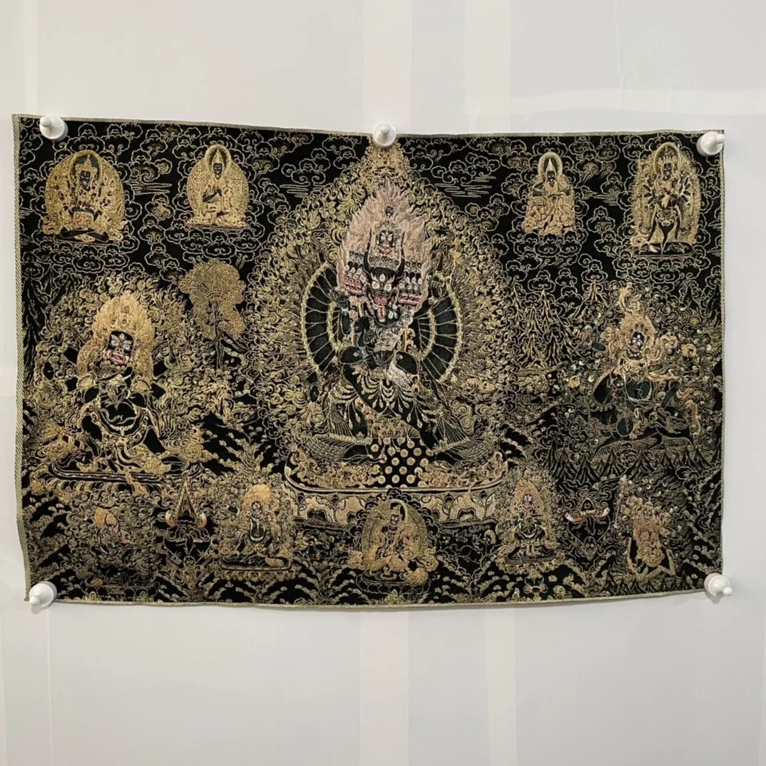 Handmade Tibetan Thangka Embroidery Deity Decor: Size: Height 90 cm - Length 60 cm. Weight 0.2 kg. Materials: Embroidery, textiles. Condition: Looks like vintage. This retro-style Tibetan thangka is a beautiful work of Buddhist art, crafted using th