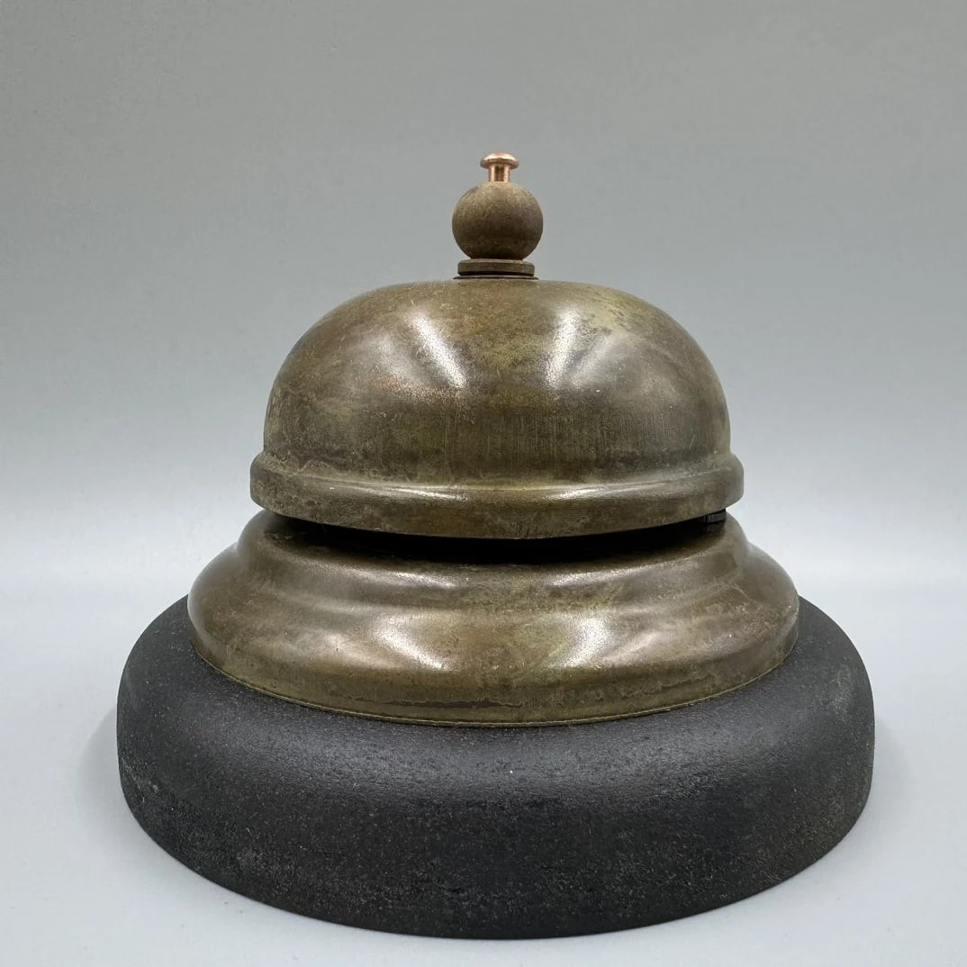 Vintage Style Asian Brass Service Bell Push Button: Size: Height 8 cm - Diameter 11 cm. Weight 268 g. Materials: Brass, metal. Condition: Appears to have a classic aesthetic. This retro style service bell features a brass dome mounted on a weighted bla