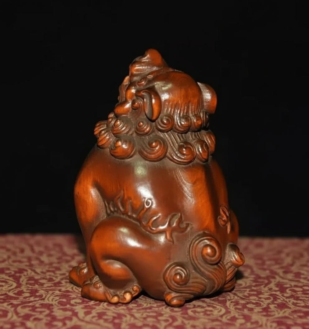 Asian Lion Hand Carved Netsuke Figurine Pendant: Size: Height 7 cm - Length 4 cm - Width 5 cm. Weight 0.2 kg. Materials: Boxwood. Condition: Appears to have a classic aesthetic. This is a small, hand-carved Chinese netsuke-style figurine made from