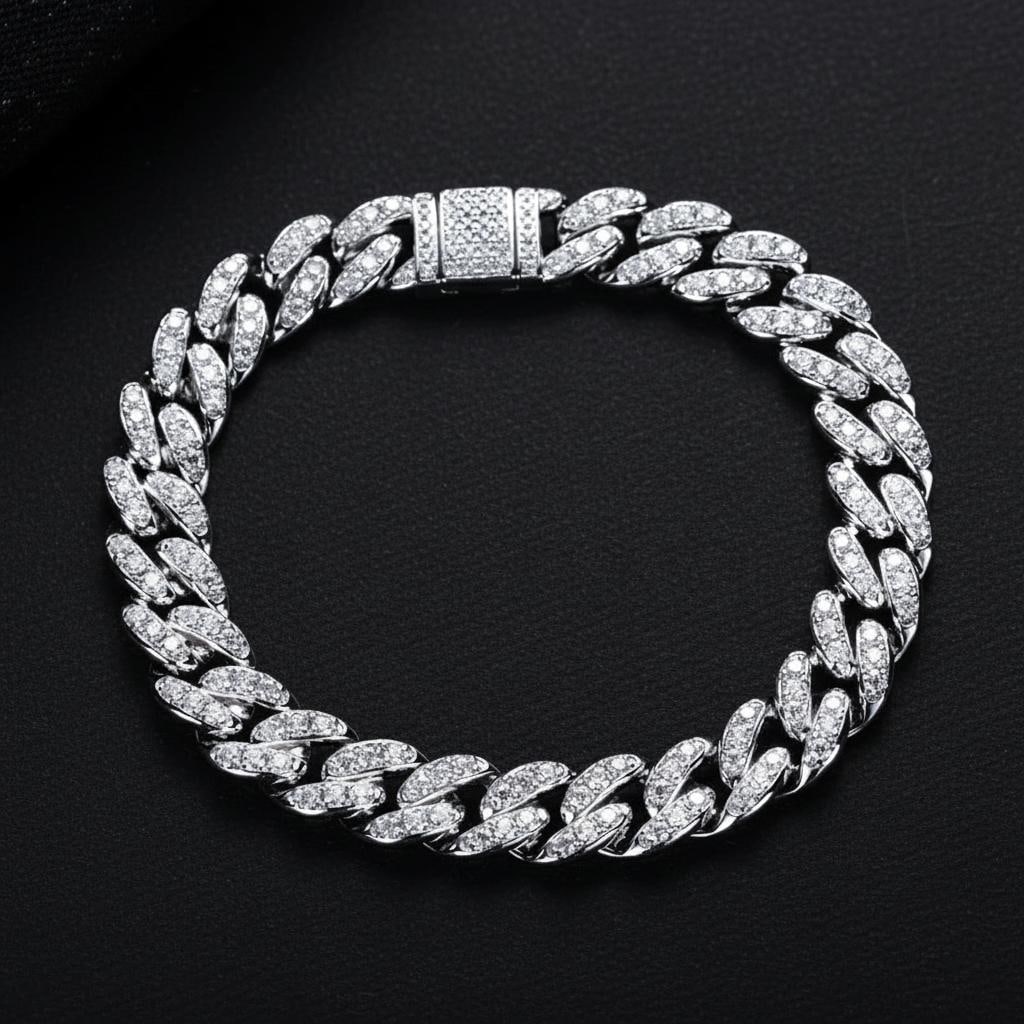 Moissanite Cuban Link Bracelet 925 Silver Iced Out: Size: Length 18 cm - Width 8 mm. Weight 21 g. Materials: 925 sterling silver, moissanite. Condition: New. This bracelet features a classic Cuban link design crafted from 925 sterling silver. It is