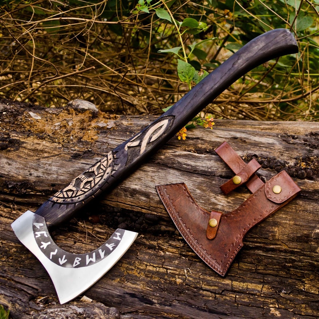 Runic Edge Carbon Steel Viking Axe Ash Handle: Size: Overall Length 62.9 cm - Blade Edge Length 17.1 cm - Axe Head Length 17.8 cm. Materials: Carbon steel, ash wood, leather. Condition: New. This handmade Viking axe or tomahawk features a carbon