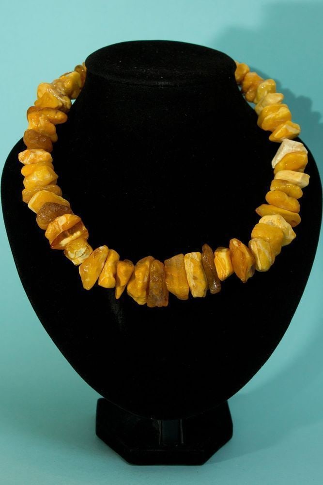 Butterscotch egg yolk raw stones vintage natural Baltic amber necklace.: A stunning Butterscotch egg yolk Baltic amber necklace weighing 136 grams. Weight: 136 grams (4.79 oz) Bead Size: 13-30 mm Circumference Length: 550 mm Stone: 100% Natural Baltic Amber Treatment: None