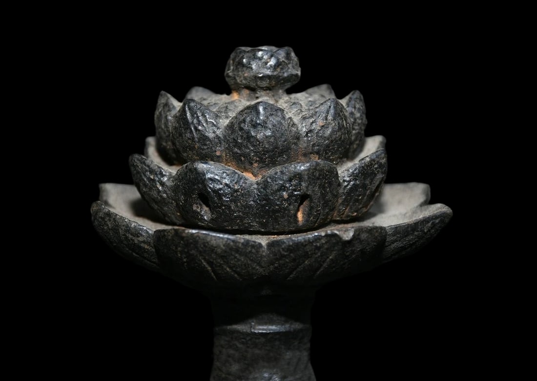 Dark Cast Metal Bloom Motif Ritual Altar Stand: Size: Height 18.3 cm - Diameter 12.2 cm. Weight 1.3 kg. Materials: Iron. Condition: Excellent. This candle holder, fashioned in the manner of traditional Chinese metalwork, is a captivating and intric