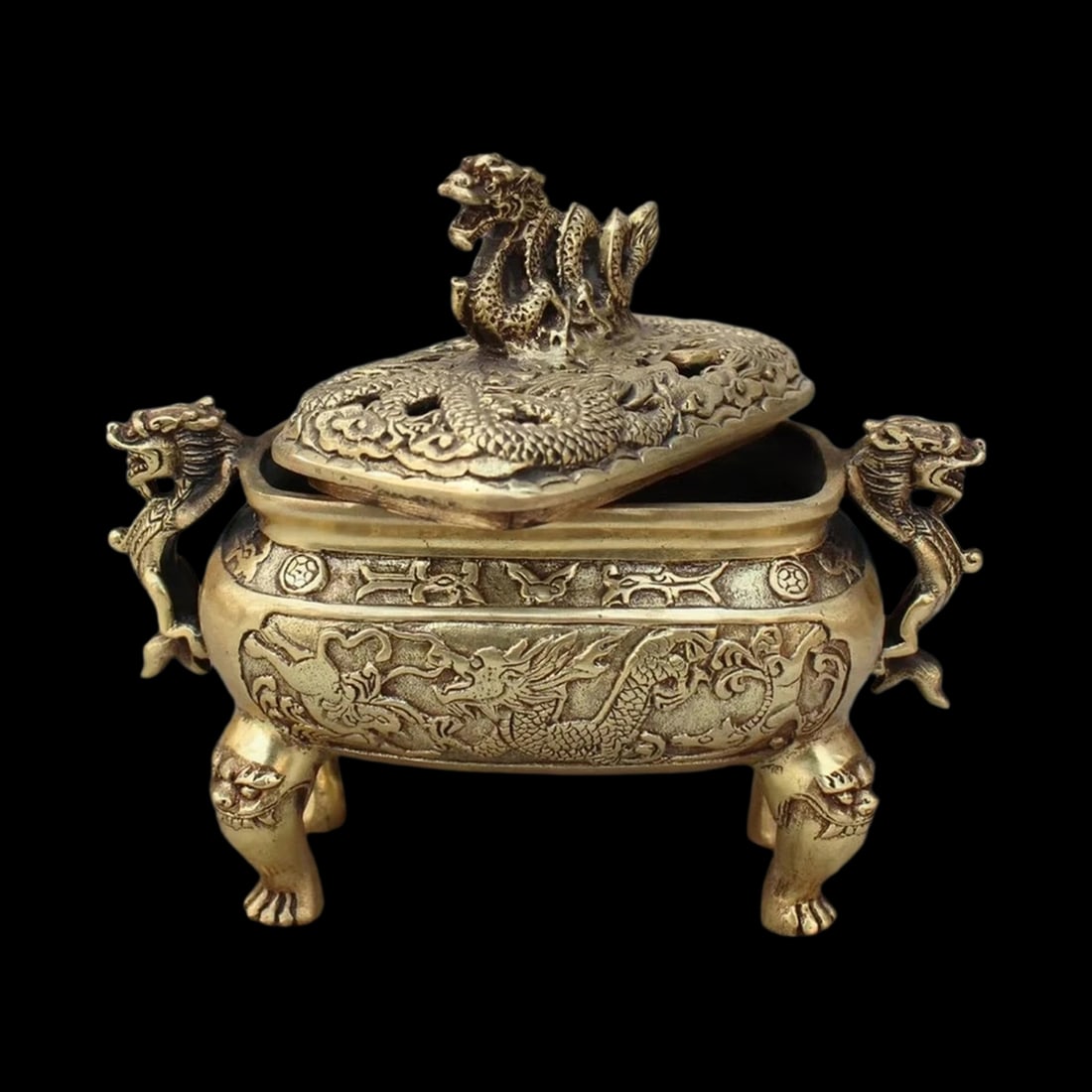 Chinese Antique Style Bronze Dragon Burner Incense: Size: Height 15 cm - Width 12 cm. Materials: Brass. Condition: Resembles a retro aesthetic. This exquisite incense burner is cast in brass and features a dynamic dragon motif that embodies strength
