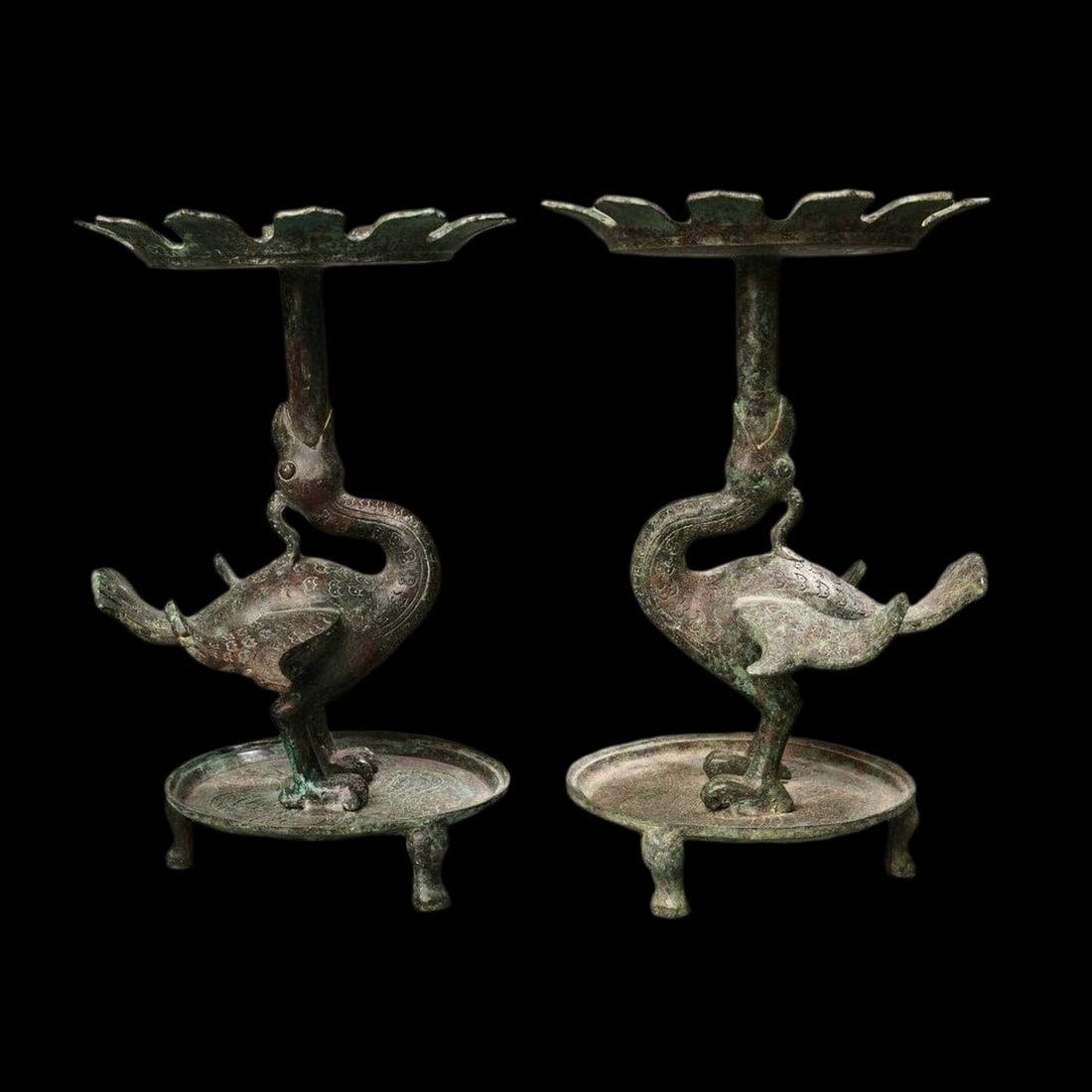 Vintage Bronze Phoenix Bird Candle Holder Candlestick Pair: Size: Height 30 cm - Length 19 cm - Width 19 cm. Weight 5.5 kg. Materials: Bronze Condition: Excellent This pair of candle holders features the elegant form of a phoenix bird, inspired by designs