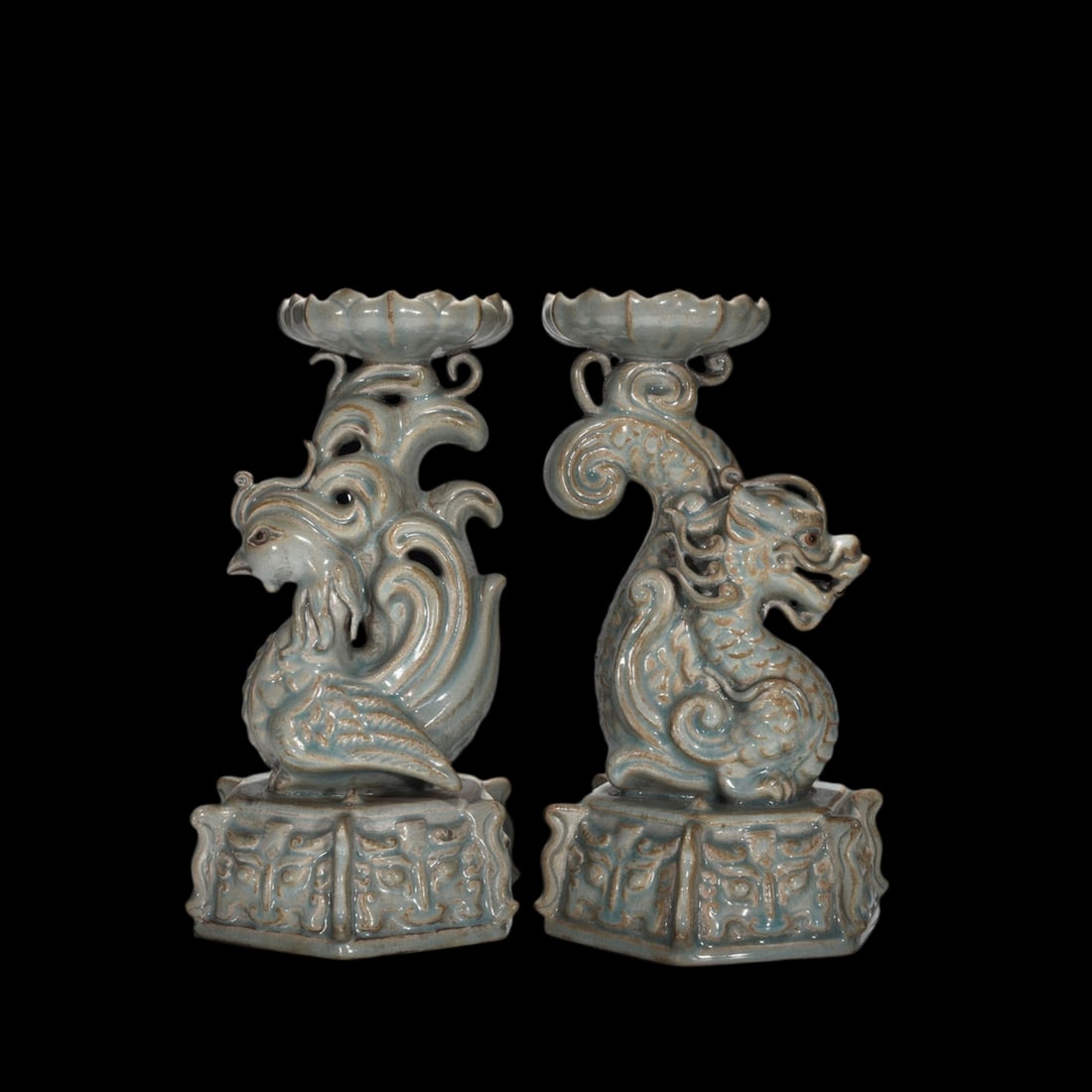 Archaic Style Porcelain Ru Kiln Candlesticks Pair: Size: Height 24.5 cm - Diameter 13 cm. Materials: Porcelain. Condition: Resembles a retro aesthetic. This elegant pair of candlesticks is crafted in the iconic Ru kiln style, known since the Song