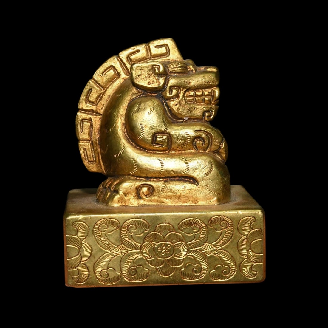 Gilded Bronze Celestial Dragon Signet Stamp Statue: Size: Height 7.4 cm - Length 5.8 cm - Width 5.8 cm. Weight 0.6 kg. Materials: Bronze, gilt. Condition: Resembles a retro aesthetic. This piece is fashioned in the manner of an imperial dynastic