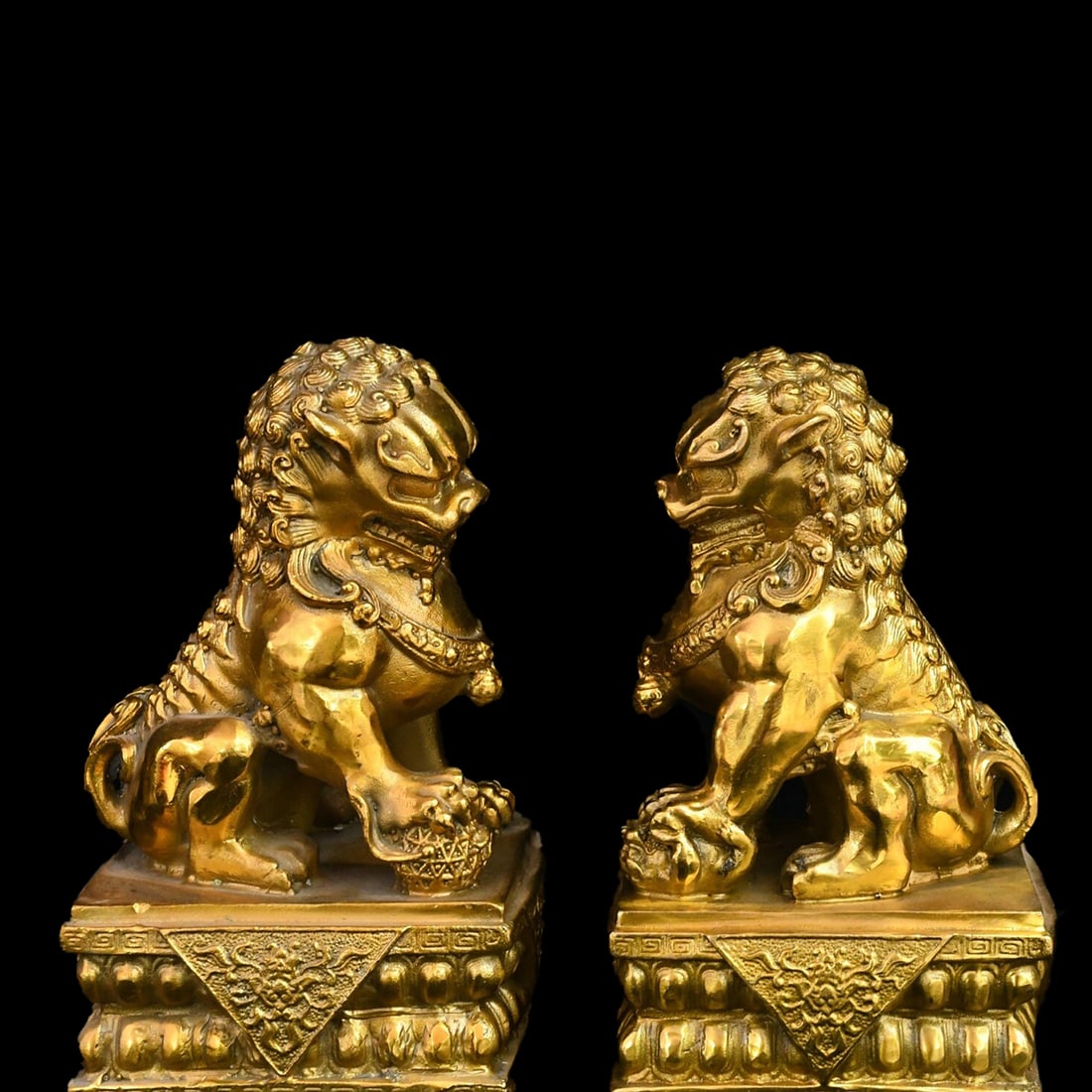 Retro Style Brass Dog Guardian Sculpture Pair: Size: Height 21.8 cm - Length 9.9 cm - Width 11.9 cm. Weight 2.1 kg. Materials: Brass. Condition: Excellent. This powerful pair of Fu Dog (Guardian Lion) sculptures are expertly cast from solid brass,