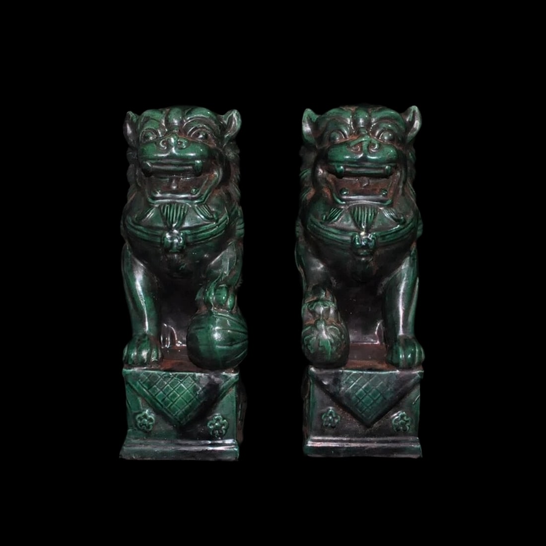 Old Style Porcelain Guardian Dogs Statue Pair: Size: Height 31 cm - Length 19 cm - Width 10.5 cm. Weight 4.8 kg. Materials: Porcelain. Condition: Appears to have a classic aesthetic. Crafted in a classical aesthetic, this striking statue of the Ev