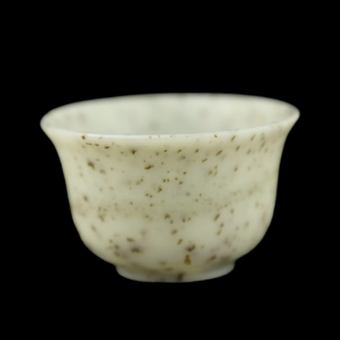Asian Old Style Interspersion Pattern Jade Cup: Size: Height 3.8 cm - Length 5.8 cm. Materials: Hetian jade. Condition: Excellent. This Chinese teacup is expertly carved from a single block of natural Hittite jade, showcasing a classic cylindrical 