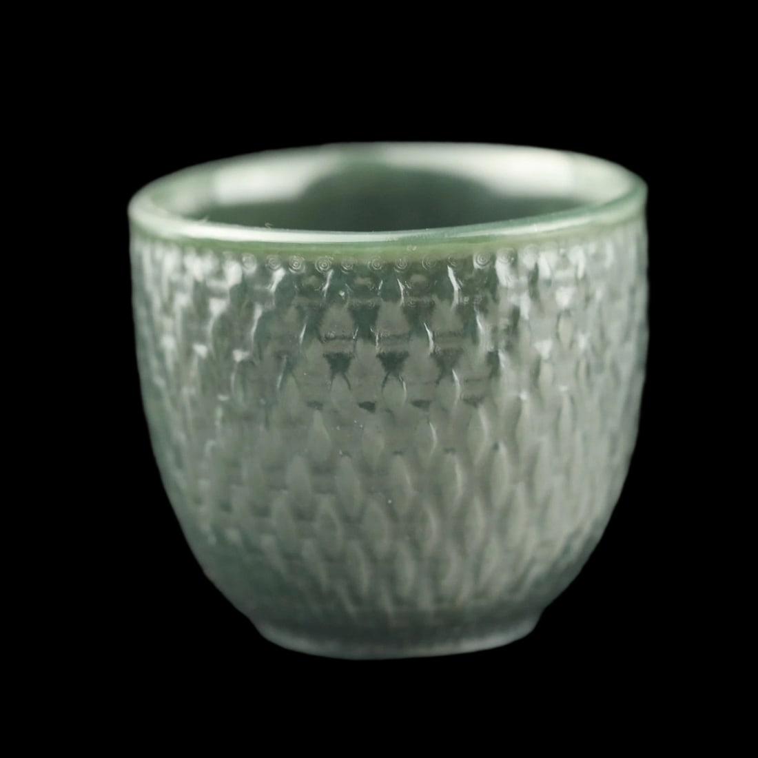 Chinese Old Style Hand Carved Hetian Jade Tea Cup: Size: Height 4.5 cm - Length 5.1 cm. Materials: Hetian jade. Condition: Excellent. This Chinese teacup is expertly carved from a single block of Hetian jade, with a deep bowl-shaped silhouette and a