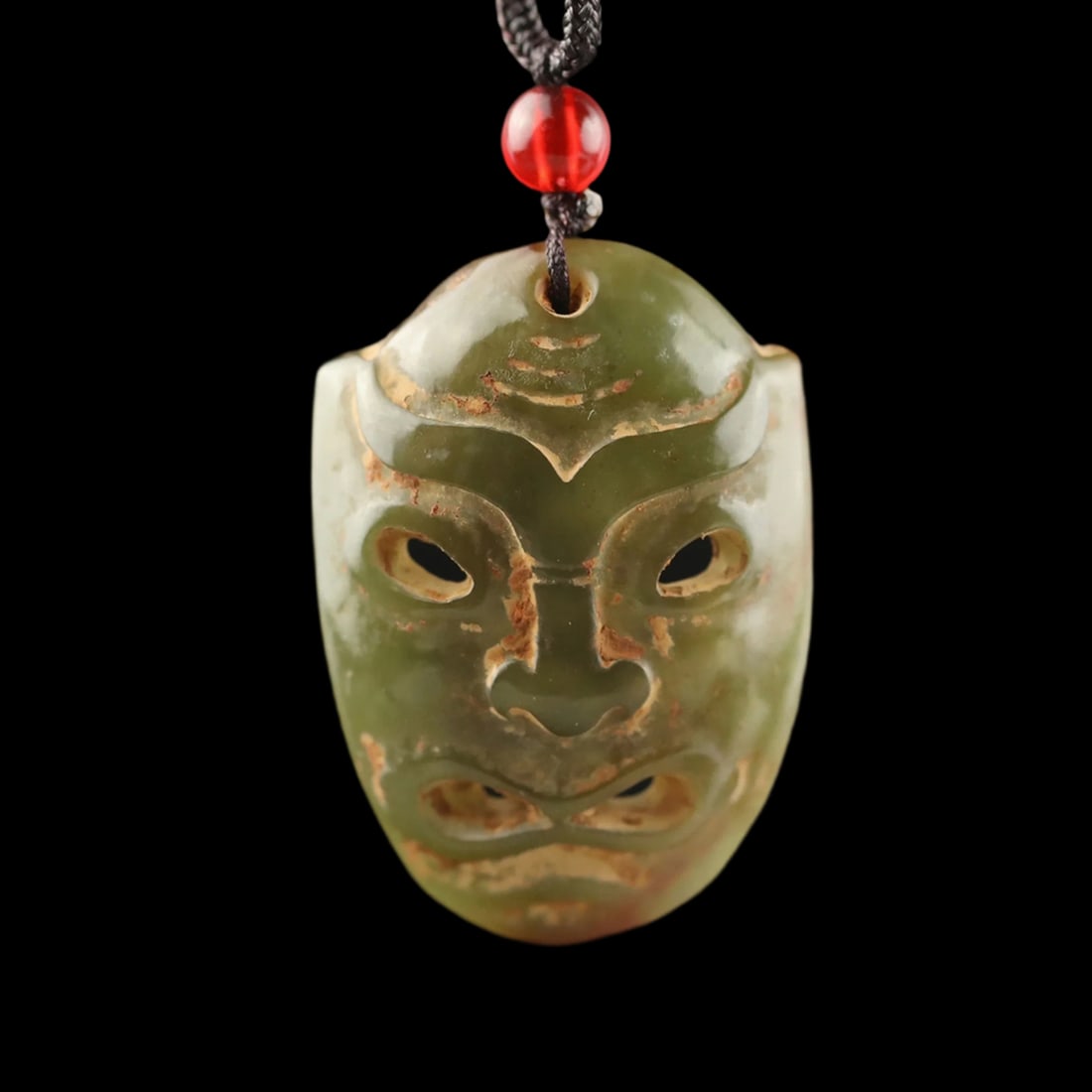Asian Antique Style Jade Arhat Mask Motif Pendant: Size: Height 3.9 cm - Length 2.8 cm - Width 1.0 cm. Weight 11 g. Materials: Jade. Condition: Resembles a retro aesthetic. This striking pendant necklace is expertly hand-carved from Hittite jade, feat