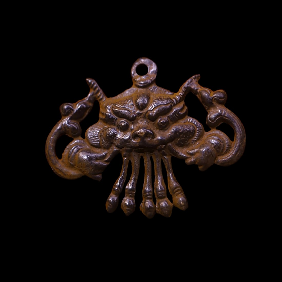 Oriental Retro Style Garuda Pattern Amulet Pendant: Size: Height 5.5 cm - Length 7 cm. Materials: Bronze, cinnabar. Condition: Resembles a retro aesthetic. This Tibetan amulet pendant is a masterfully cast bronze pendant depicting the powerful face of 