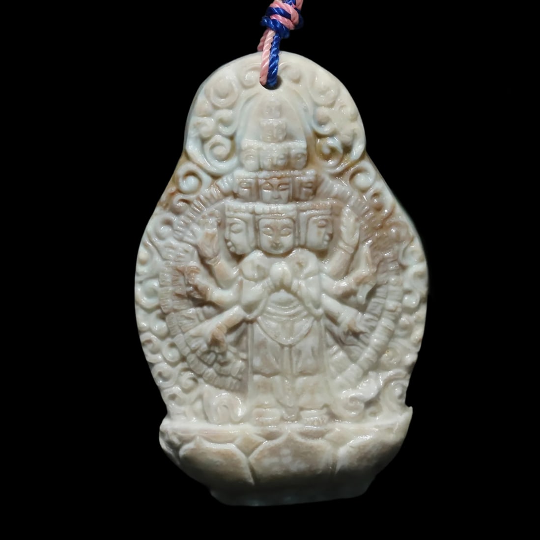 Agate Kwan Yin Dragon Eye Pattern Amulet Pendant: Size: Height 4.9 cm - Length 3.2 cm - Width 1.2 cm. Materials: Agate. Condition: Resembles a retro aesthetic. This Tibetan amulet pendant is carved from agate and features an intricate sculptural depi