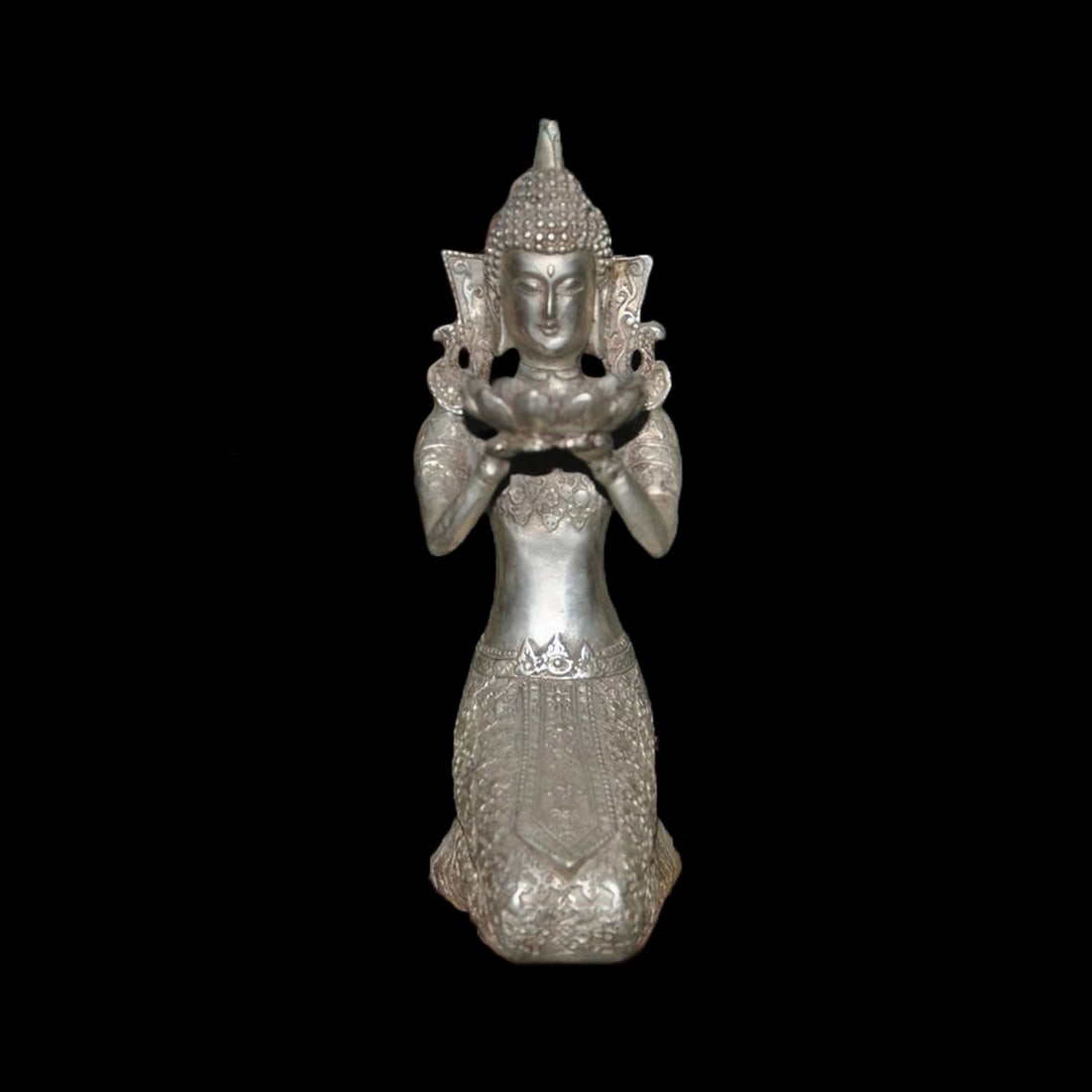 Asian Vintage Style Tibet Silver Buddha Figure: Size: Height 13 cm - Length 7 cm - Width 10 cm. Weight 1.3 kg. Materials: Tibetan Silver (alloy of tin with copper or zinc). Condition: Looks like vintage. This sacred ritual candlestick is a masterfu