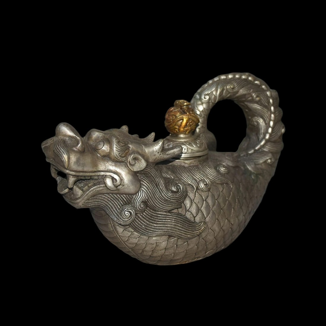 Oriental Antique Style Silver Gilt Fish Pot Figure: Size: Height 16.8 cm - Length 23.9 cm - Width 8.9 cm. Materials: Bronze, Tibetan silver (alloy of tin with copper or zinc), gilt. Condition: Excellent. This extraordinary ritual jug is a masterfully