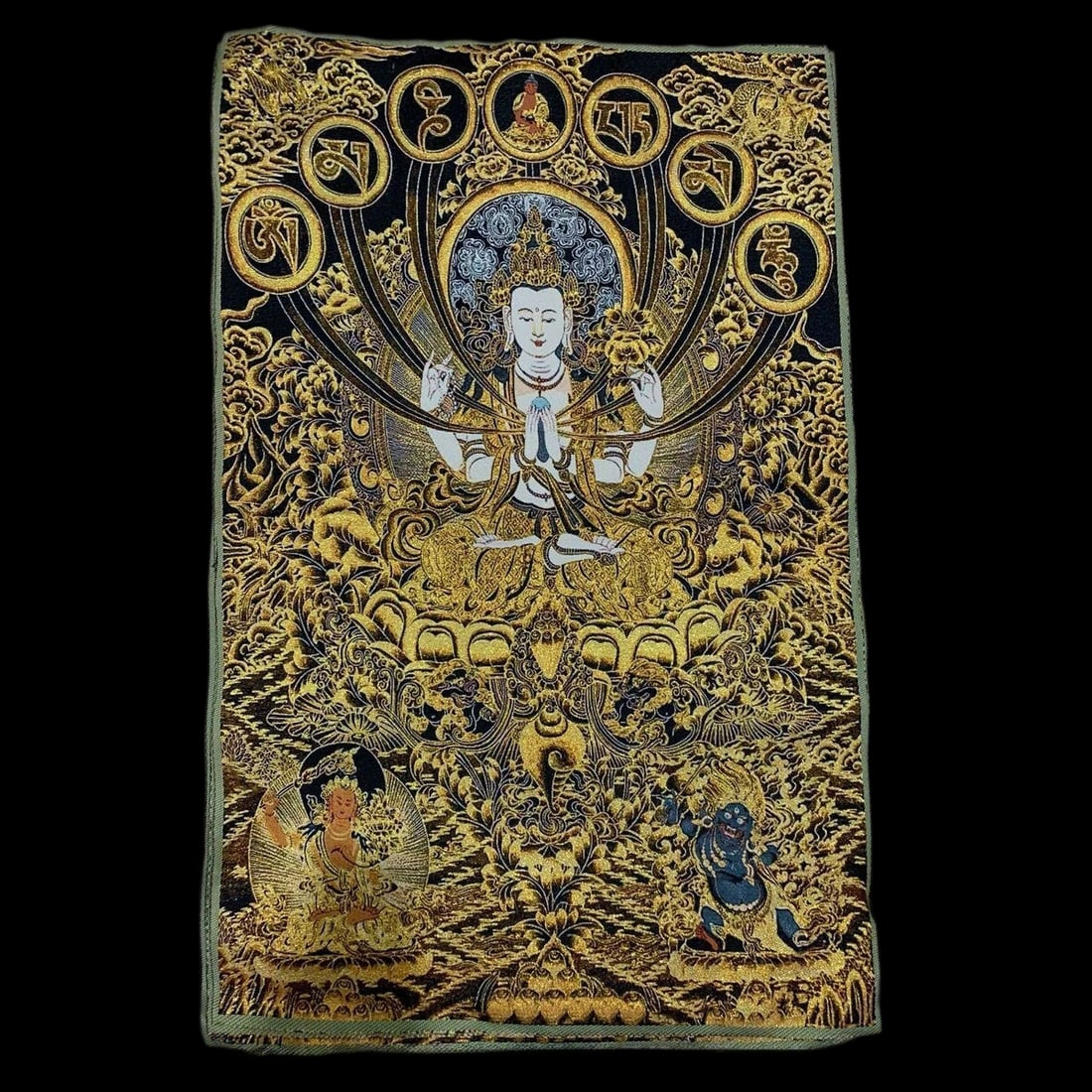 Vintage Silk Embroidery Four Arms Chenrezig Buddha Thangka Painting: Size: Height 60 cm - Length 90 cm. Weight 200 g. Materials: Silk Condition: Excellent This wall hanging features a detailed depiction of the four-armed Chenrezig Buddha. The embroidery showcases intri