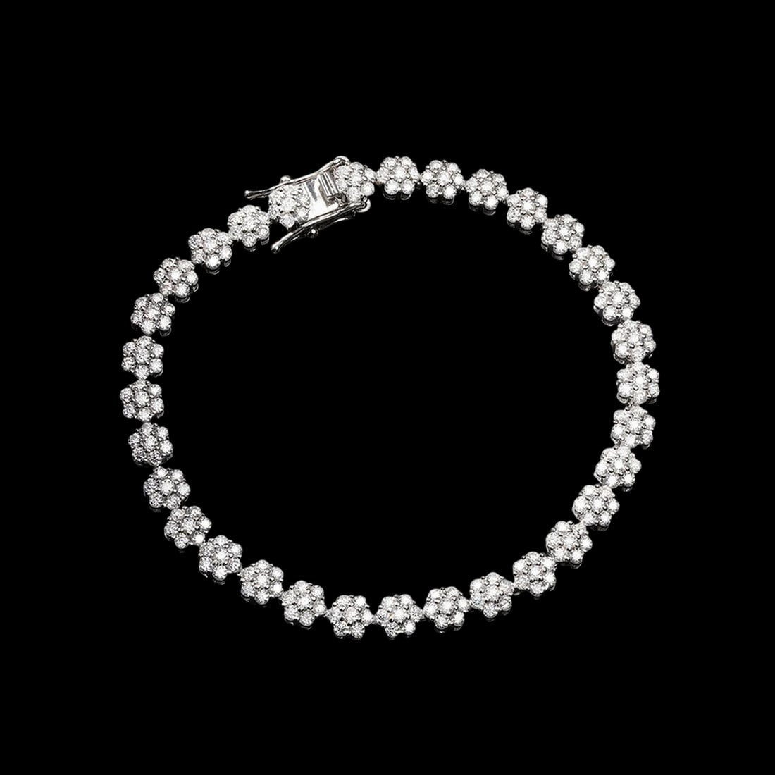 Silver 925 Bracelet Moissanite Floral Shade Motif: Size: Width 8 mm - Length 15 cm. Weight 7.43 g. Materials: S925 silver, moissanite. Condition: New. This flower-shaped moissanite bracelet is an accessory with a bold, structural profile that reinterp