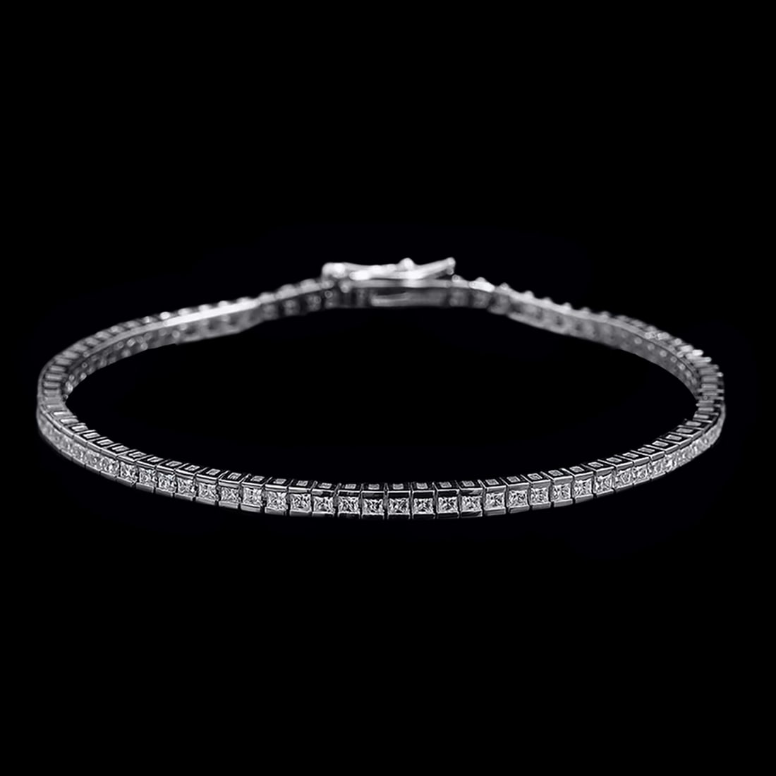 Icy Moissanite Bracelet Minimalist Silver 925: Size: Width 1.5 mm - Length 17 cm. Weight 8.12 g. Materials: S925 Silver, moissanite. Condition: New. This Princess Cut Moissanite Bracelet is a masterfully crafted piece of jewelry with a bold, struc