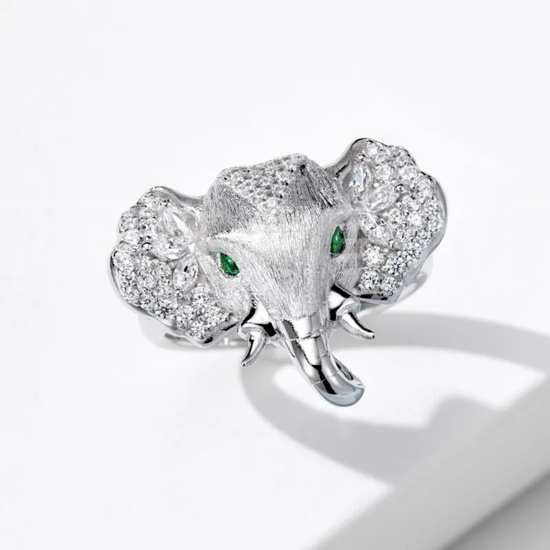 Pure Silver 925 Zircon Elephant Head Shaped Ring: Size: Diameter 16,5 mm. Weight 12 g. Materials: S925 silver, zircon. Condition: New. This elephant ring is a masterfully crafted luxury accessory with a bold, structural profile that combines whimsica
