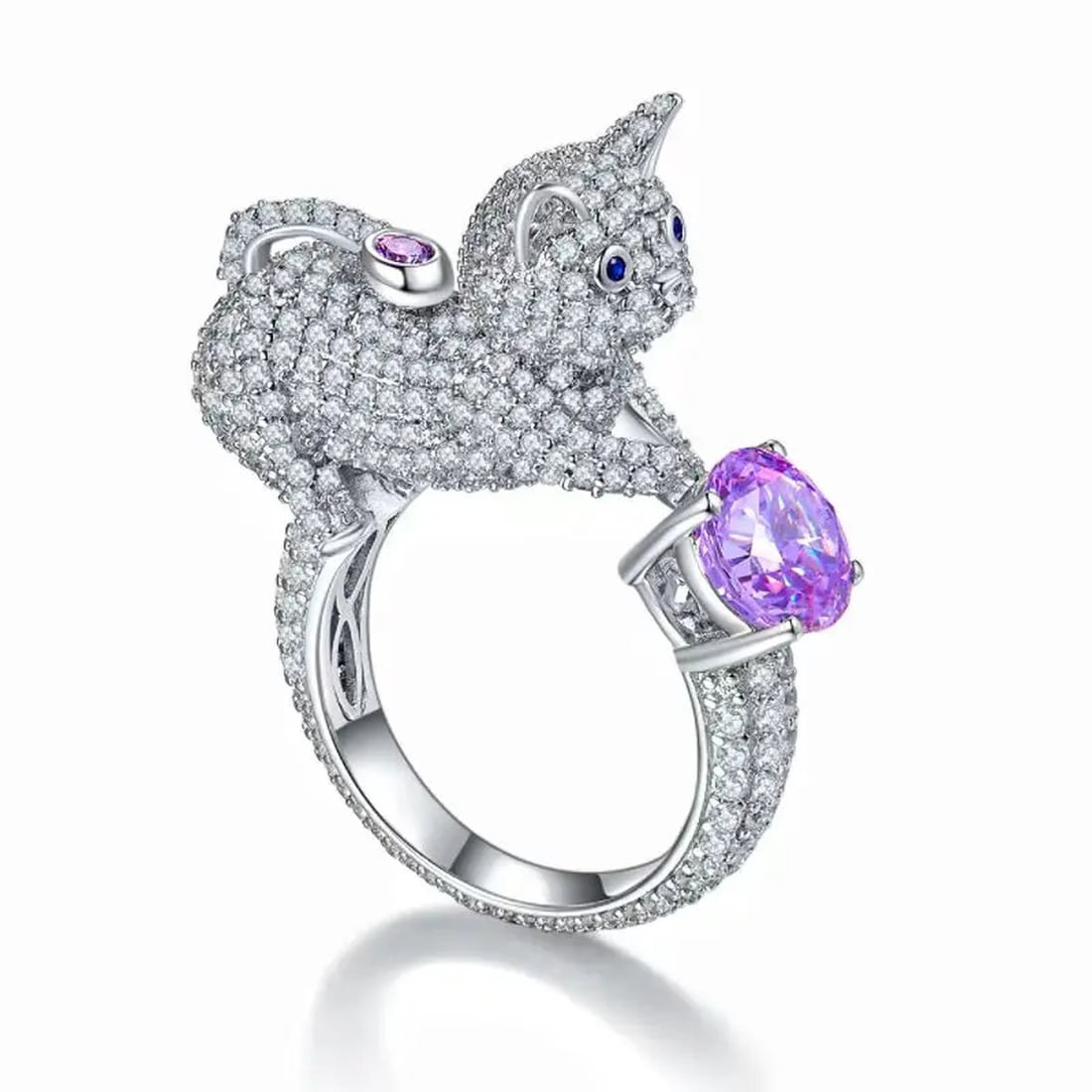 Unique Sterling Silver Moissanite Sculpted Leopard Head Bypass Ring: Size: Diameter Adjustable. Materials: 925 sterling silver, moissanite Condition: New This striking ring features an elaborate bypass design showcasing a brilliantly sculpted leopard head. The feline's