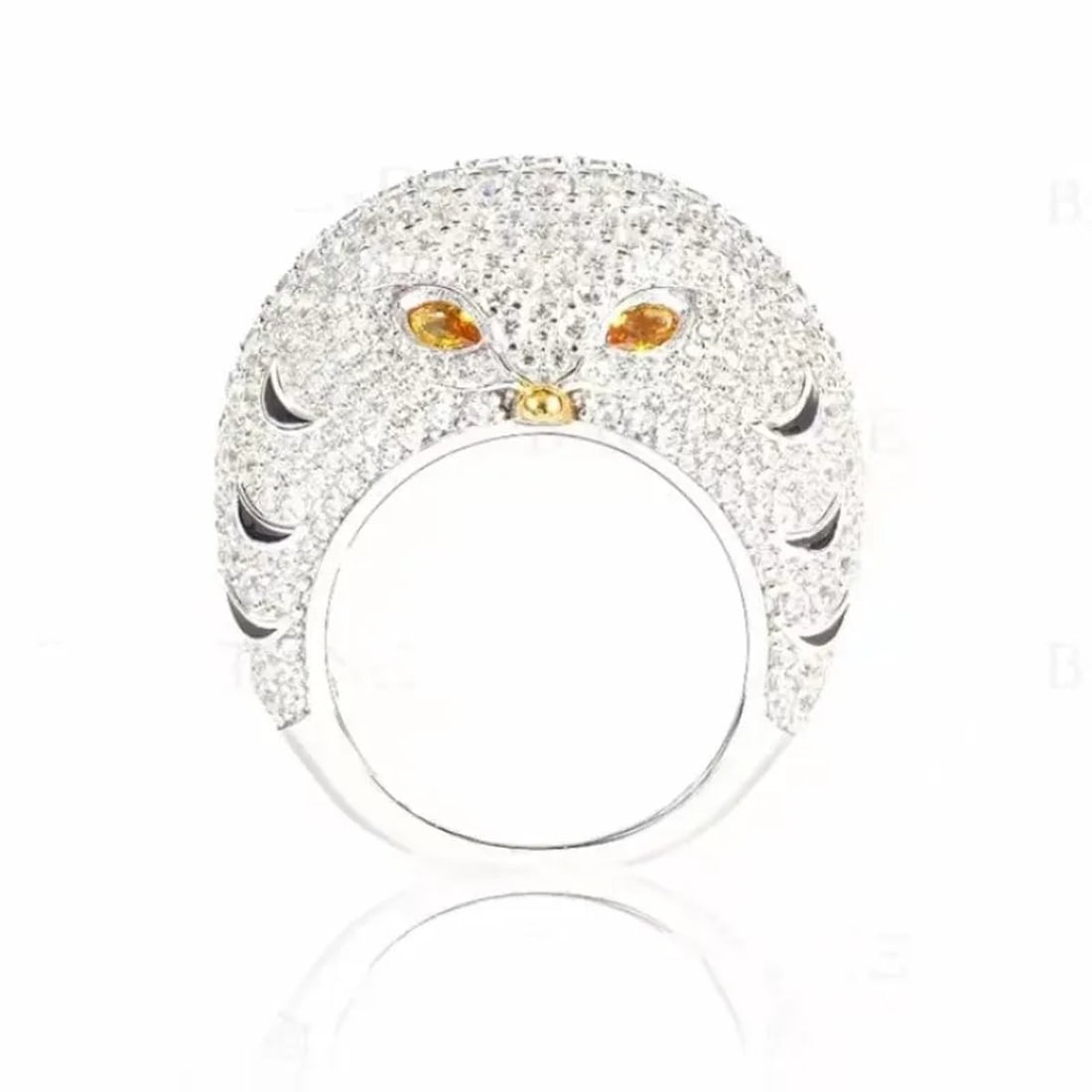 Classic Style Sterling Silver Zircon Domed Owl Head Ring: Size: Diameter 17.3 mm. Weight 15 g. Materials: 925 sterling silver, zircon Condition: New This voluminous cocktail ring is masterfully sculpted into the striking, domed silhouette of an owl's head. T